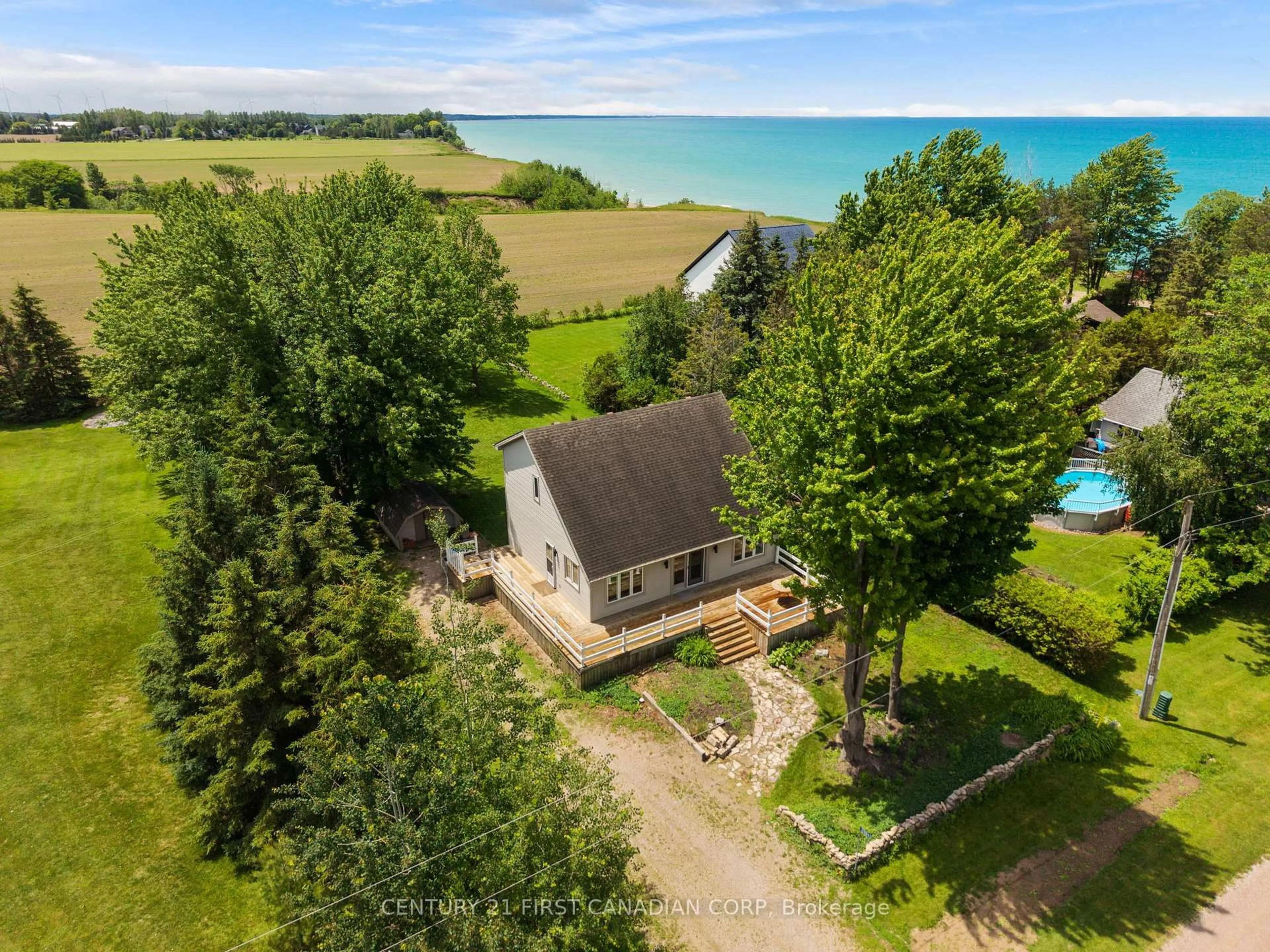A pic from outside/outdoor area/front of a property/back of a property/a pic from drone, water/lake/river/ocean view for 33943 Sunnyridge Rd, Bluewater Ontario N0M 1N0