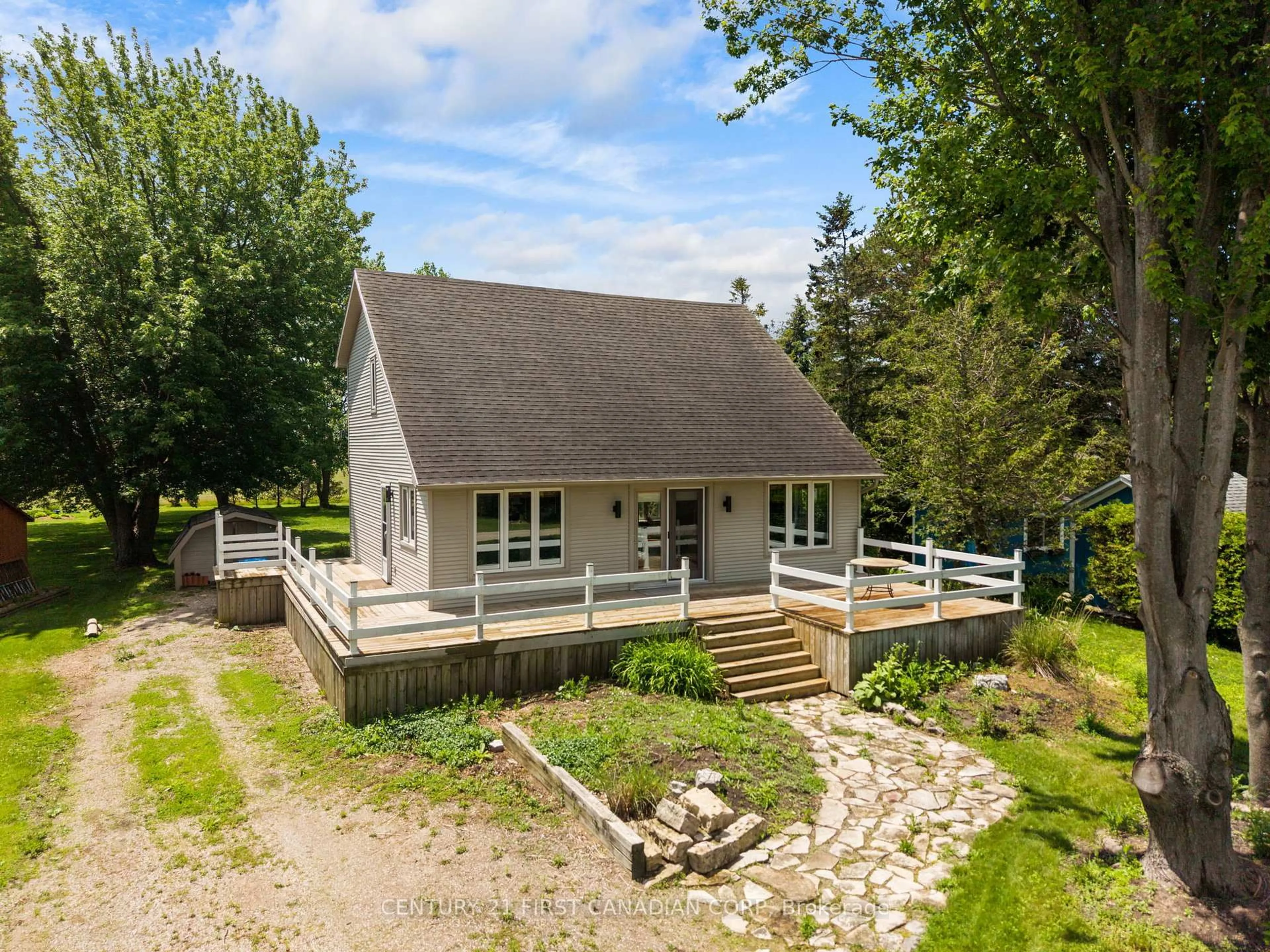 A pic from outside/outdoor area/front of a property/back of a property/a pic from drone, street for 33943 Sunnyridge Rd, Bluewater Ontario N0M 1N0