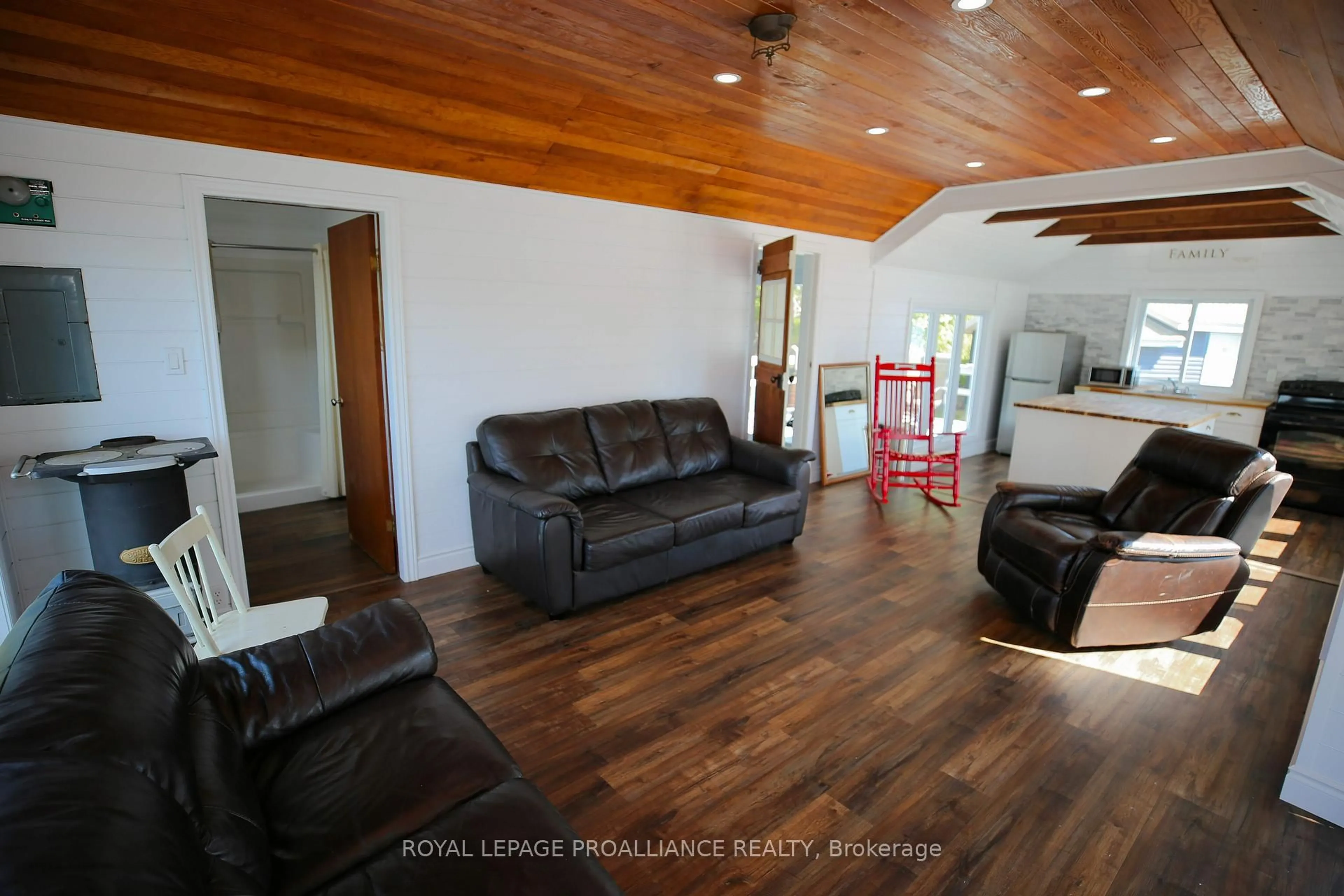 Living room with furniture, wood/laminate floor for 1 Black Cat Island, Lansdowne Ontario K0E 1L0