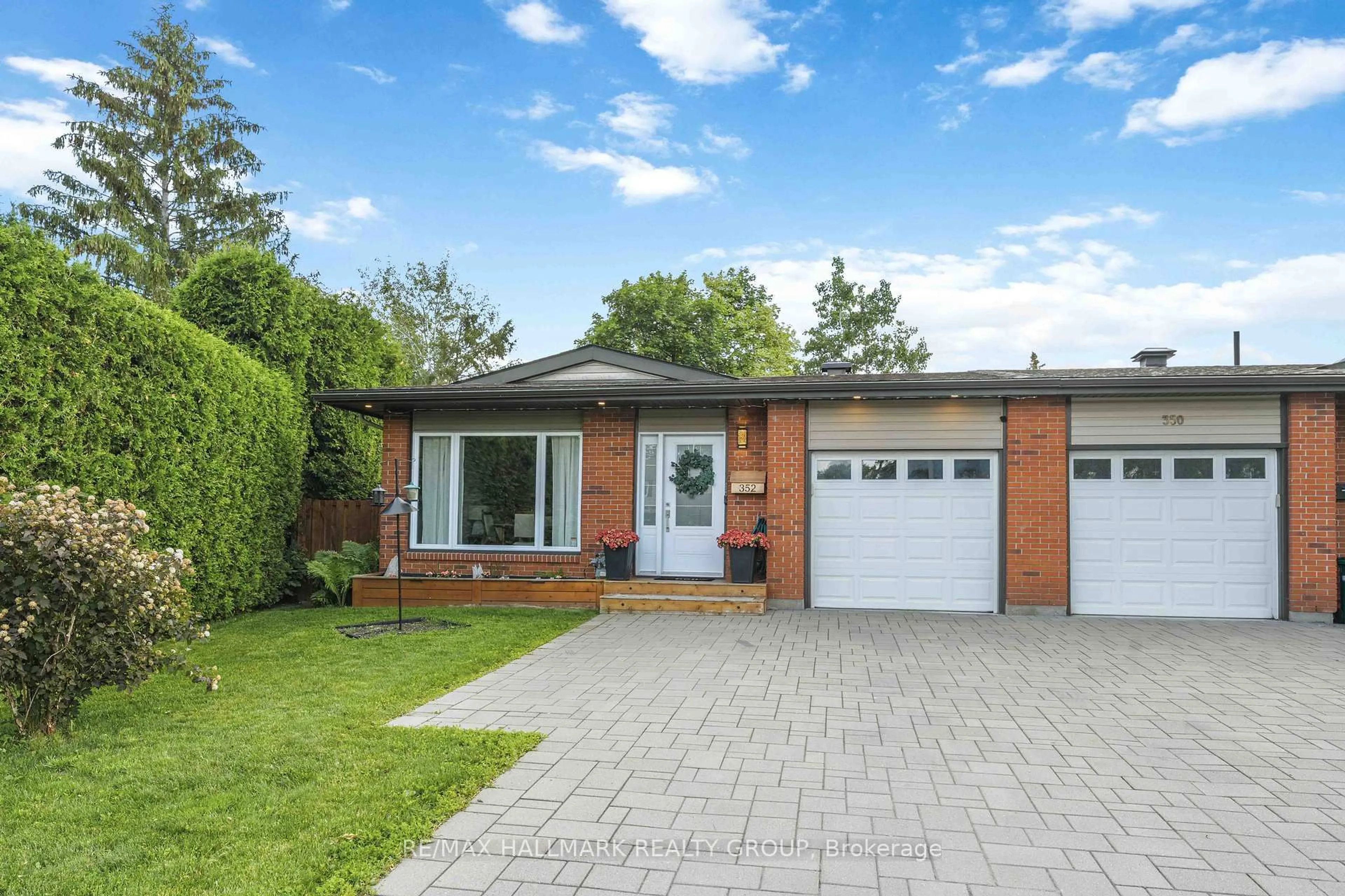 Home with brick exterior material, street for 352 Mockingbird Dr, Orleans Ontario K1E 2A7