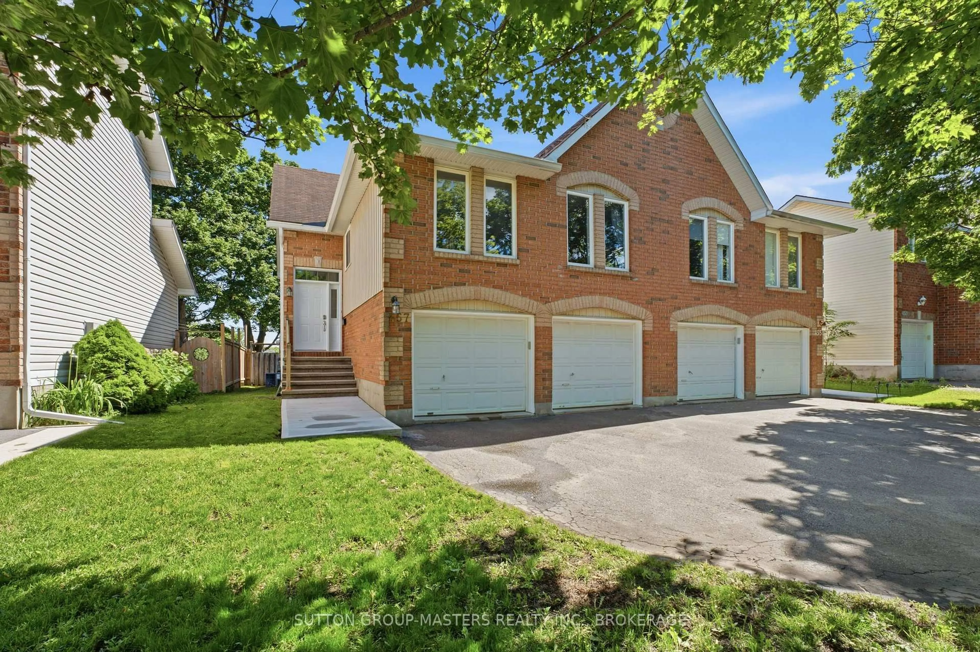 Home with brick exterior material, street for 457 Fieldstone Dr, Kingston Ontario K7K 7E4