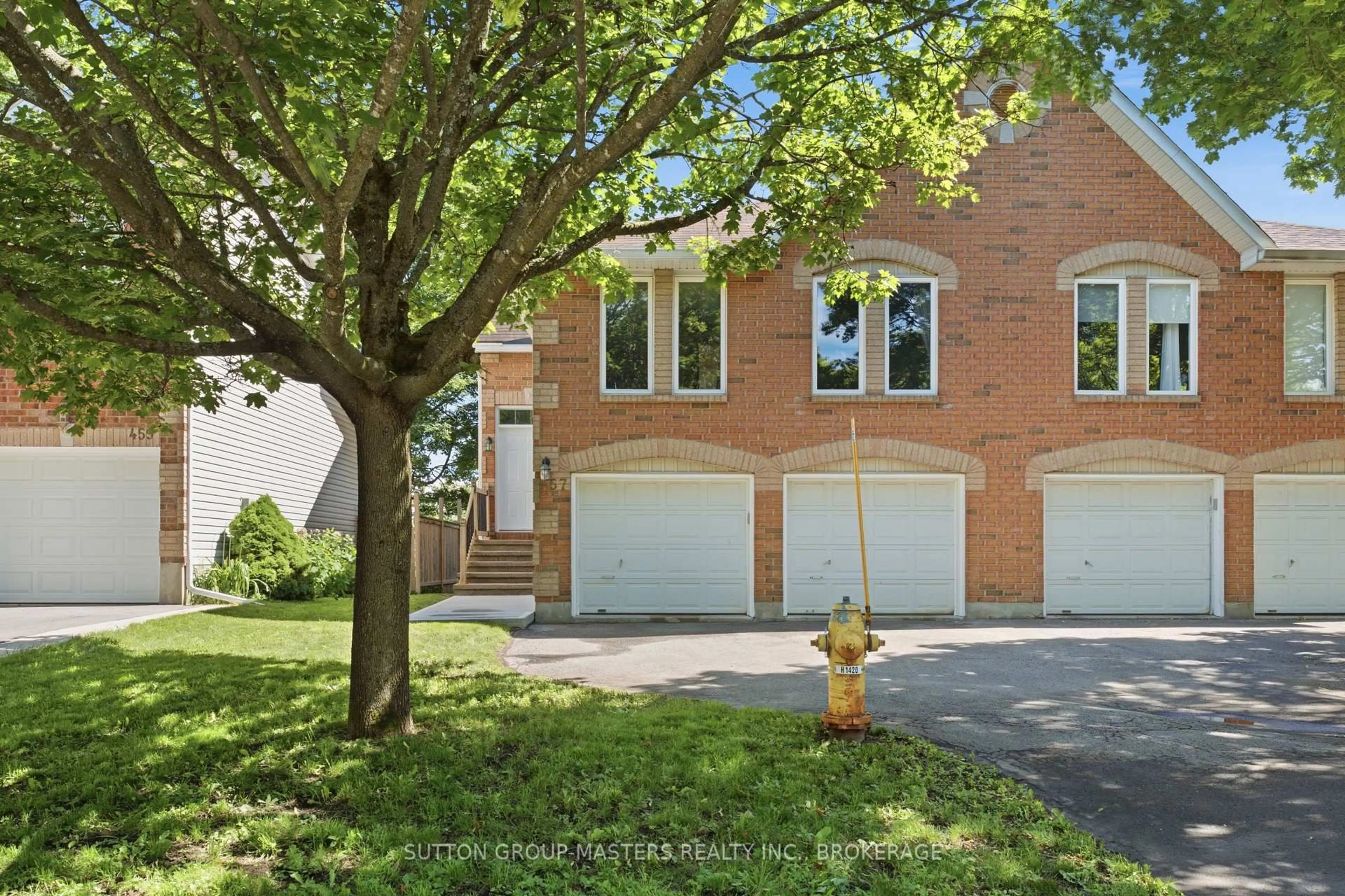 Home with brick exterior material, street for 457 Fieldstone Dr, Kingston Ontario K7K 7E4