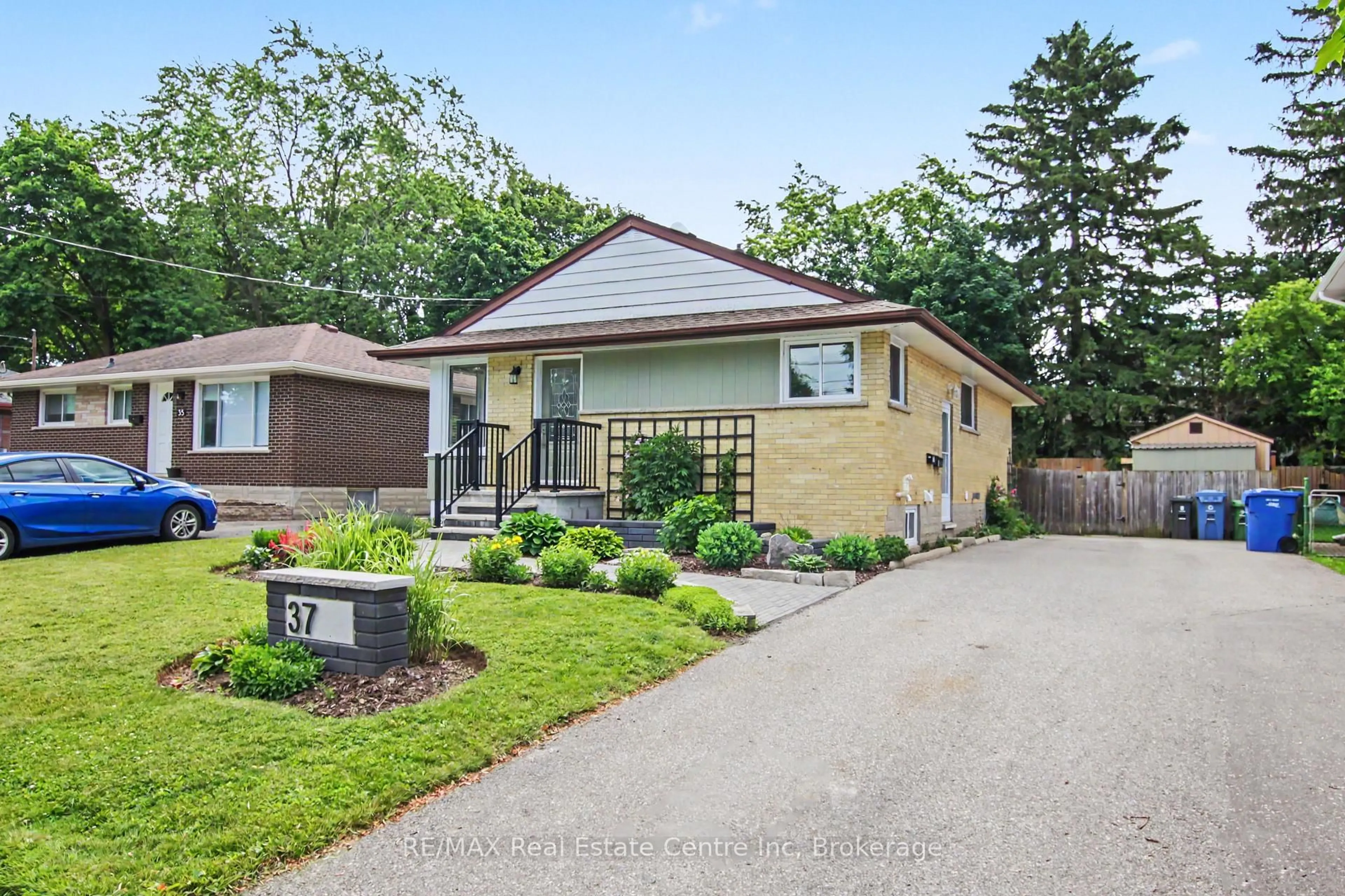 Home with brick exterior material, street for 37 Ottawa Cres, Guelph Ontario N1E 2A5
