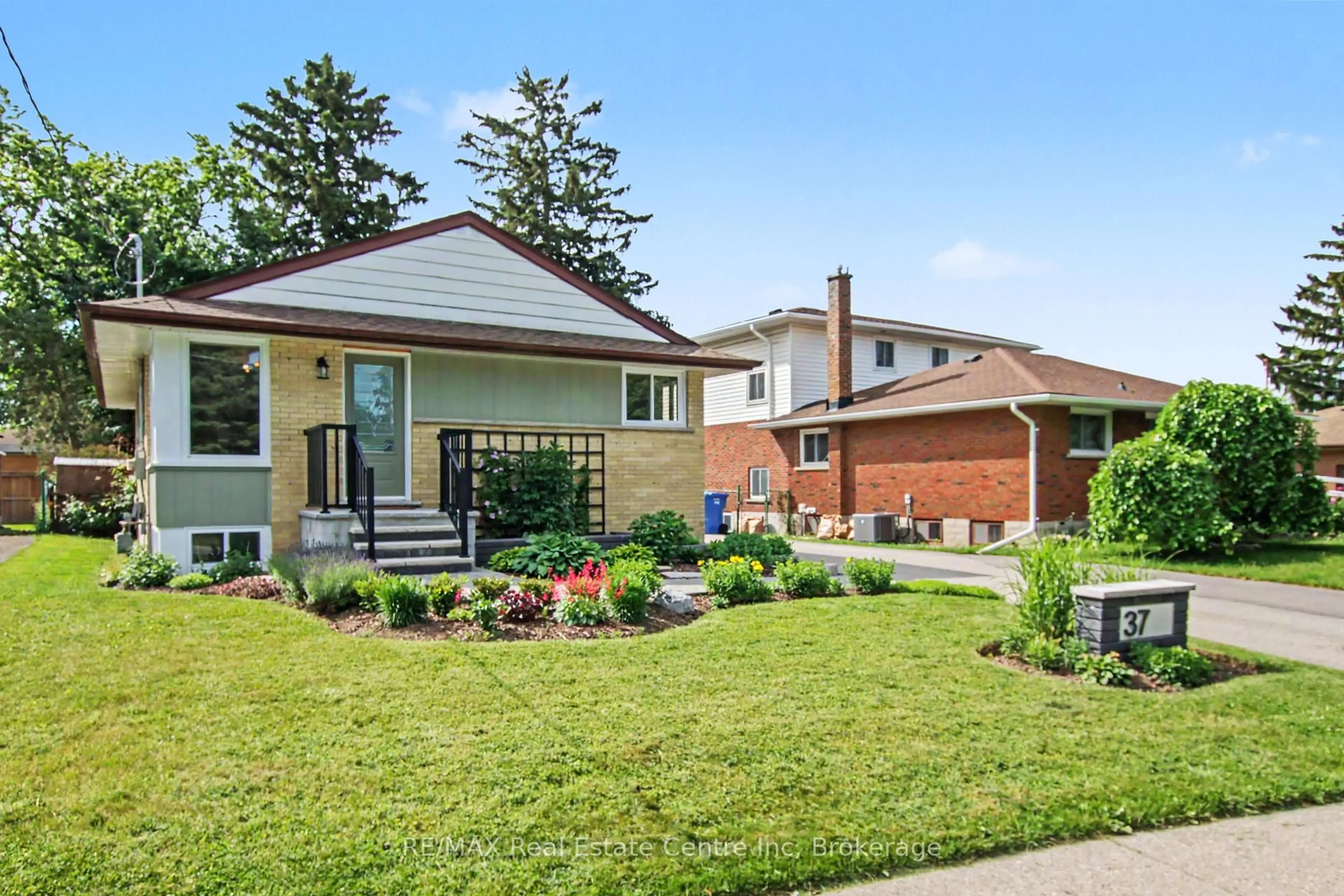 Home with brick exterior material, street for 37 Ottawa Cres, Guelph Ontario N1E 2A5