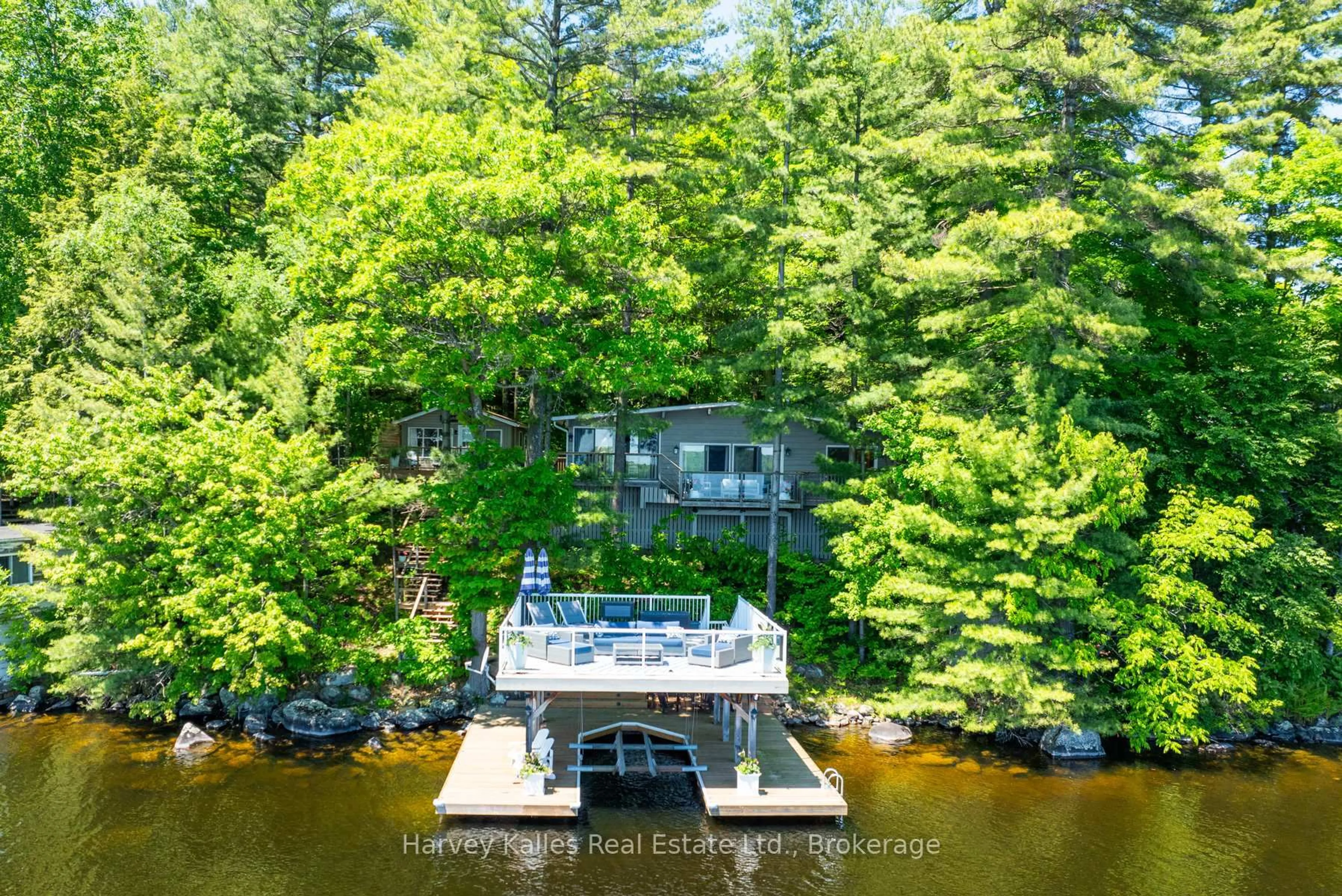 A pic from outside/outdoor area/front of a property/back of a property/a pic from drone, water/lake/river/ocean view for 1043 Muskoka Crescent Rd, Bracebridge Ontario P1L 1X2