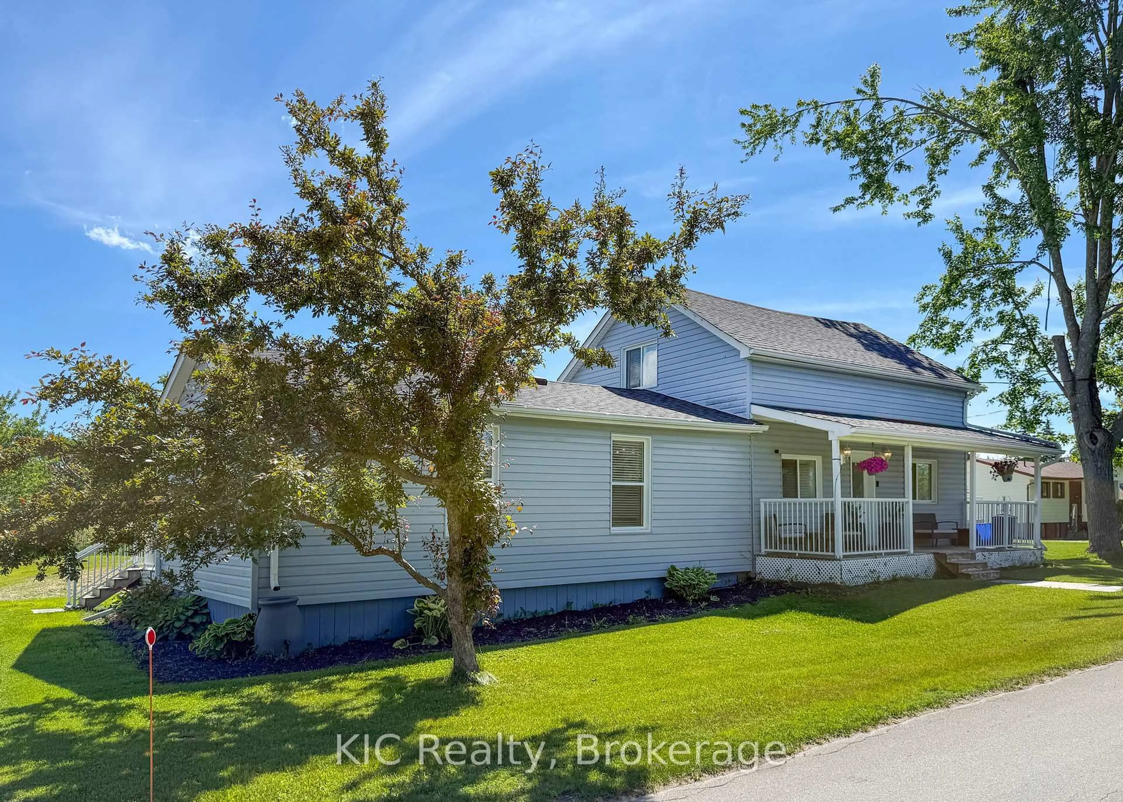 Home with vinyl exterior material, street for 1311 Charles St, Otonabee-South Monaghan Ontario K0L 1V0