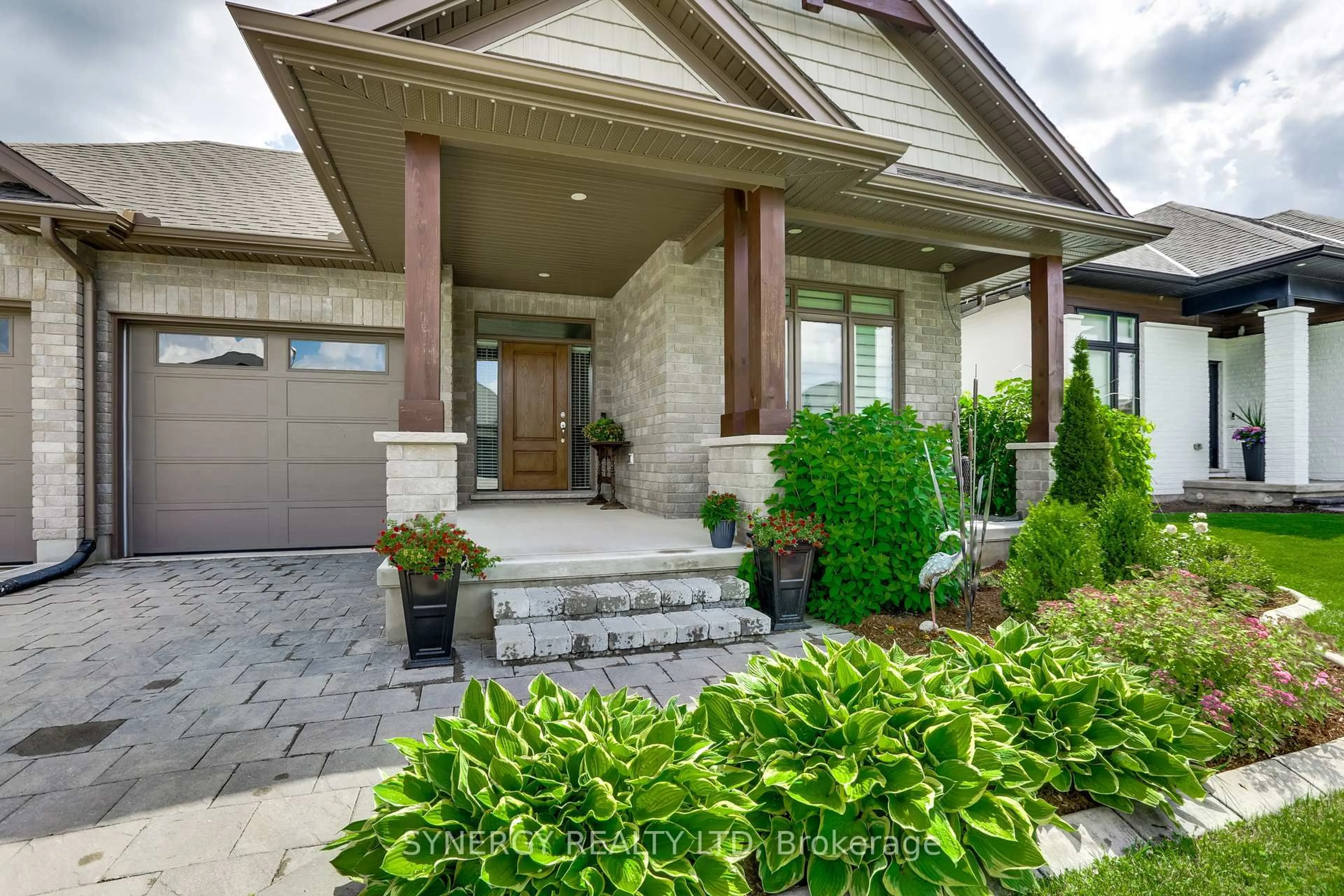 Home with brick exterior material, street for 149 Collins Way, Strathroy-Caradoc Ontario N7G 0G2