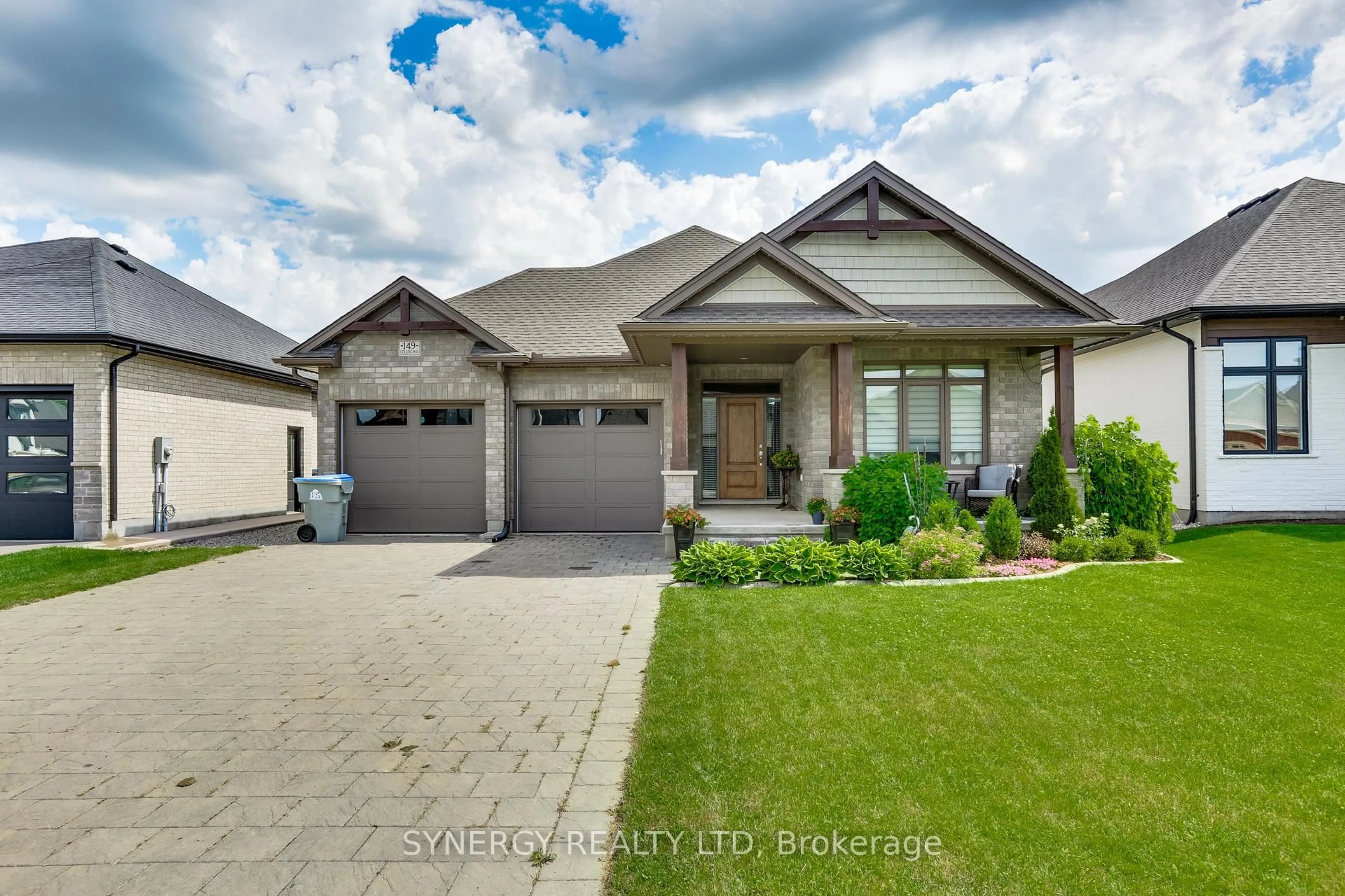 Home with brick exterior material, street for 149 Collins Way, Strathroy-Caradoc Ontario N7G 0G2