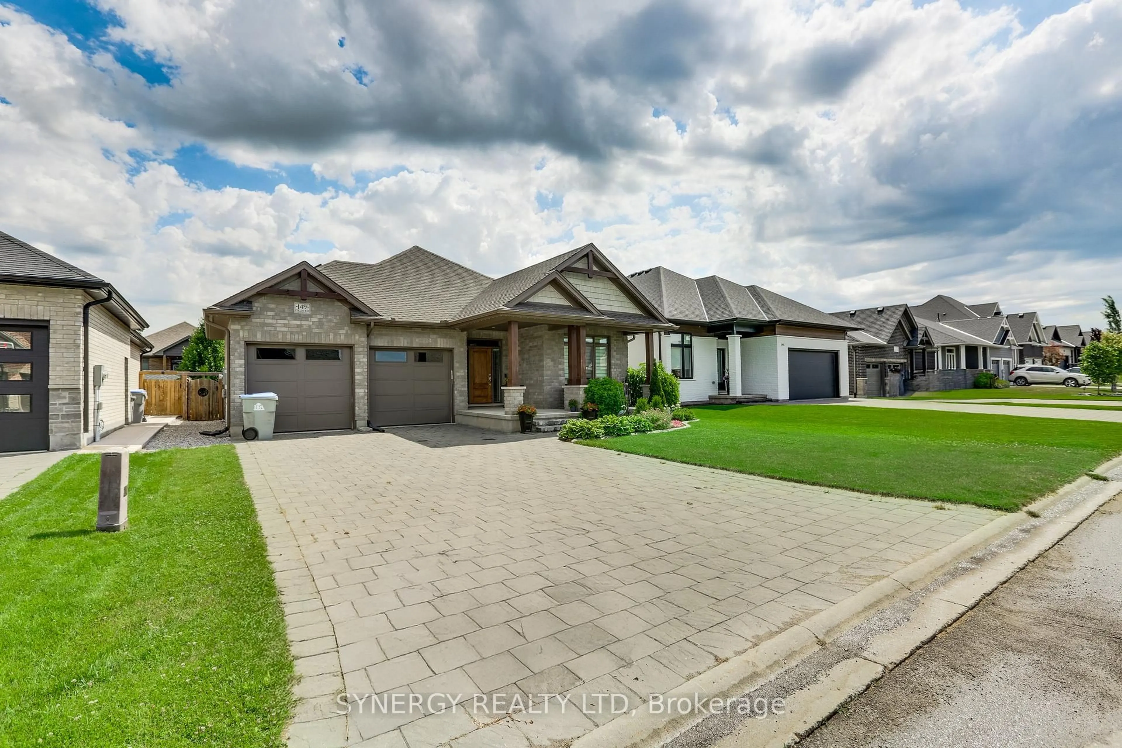 Home with brick exterior material, street for 149 Collins Way, Strathroy-Caradoc Ontario N7G 0G2