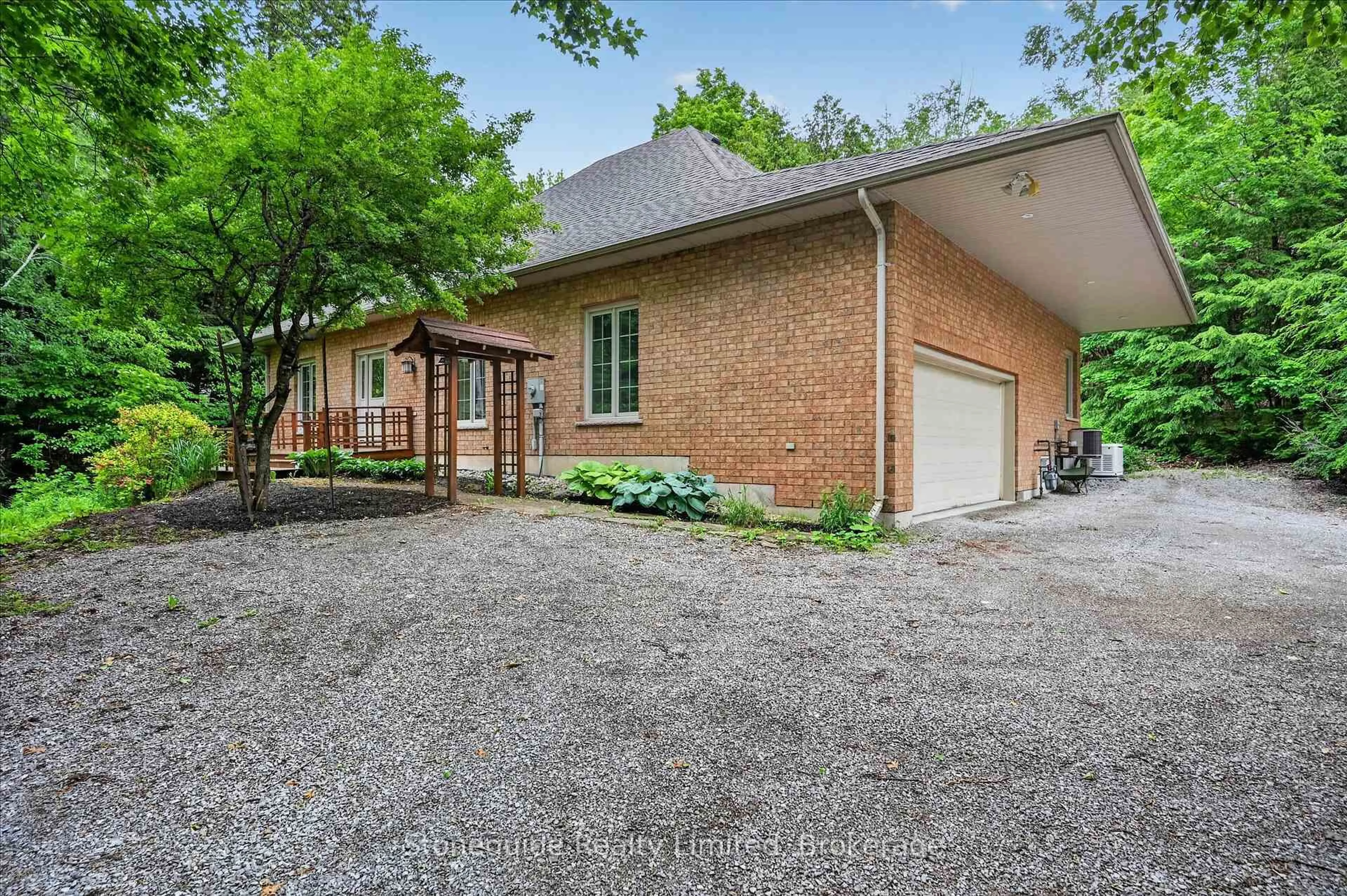 Home with brick exterior material, street for 761 Cedarhurst Dr, Selwyn Ontario K9J 0C5