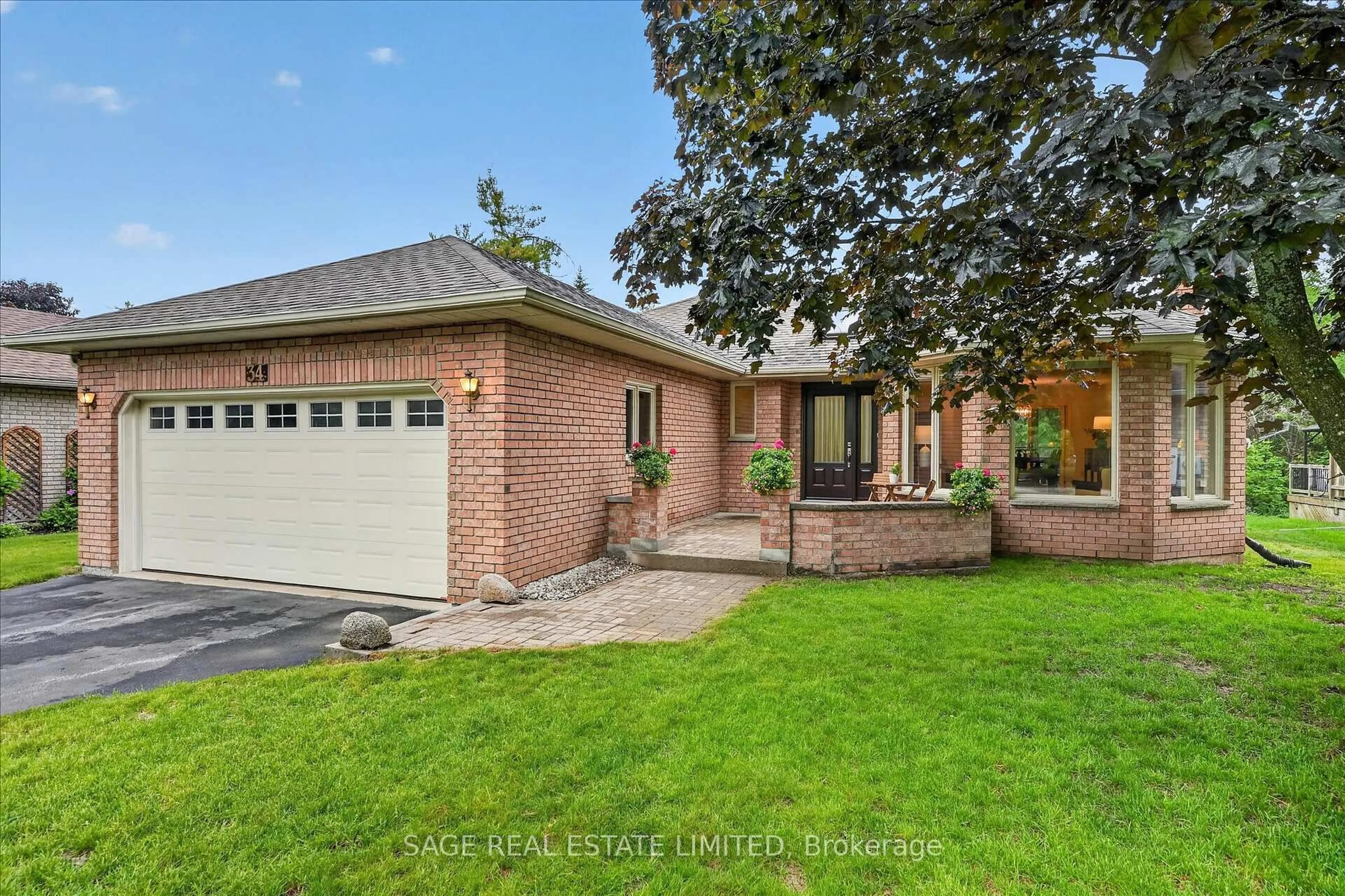 Home with brick exterior material, street for 34 Patricia Pl, Kawartha Lakes Ontario K0M 1A0