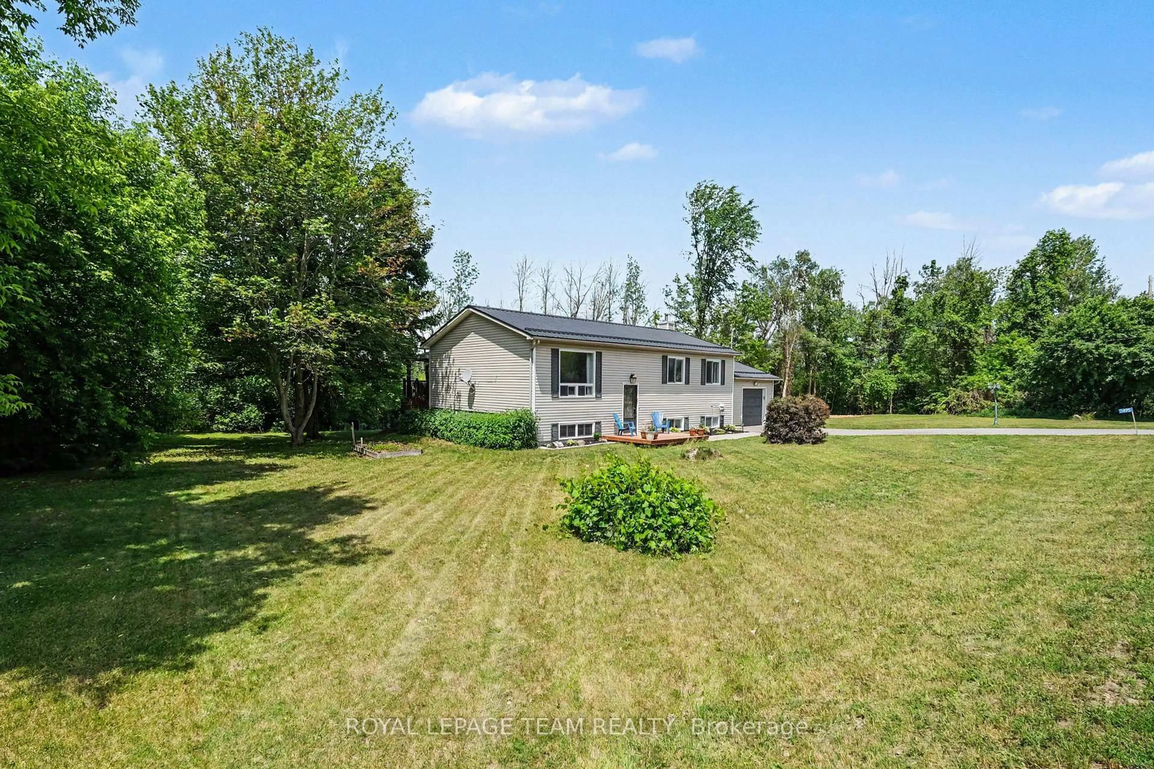 A pic from outside/outdoor area/front of a property/back of a property/a pic from drone, water/lake/river/ocean view for 2495 River Rd, North Grenville Ontario K0G 1J0