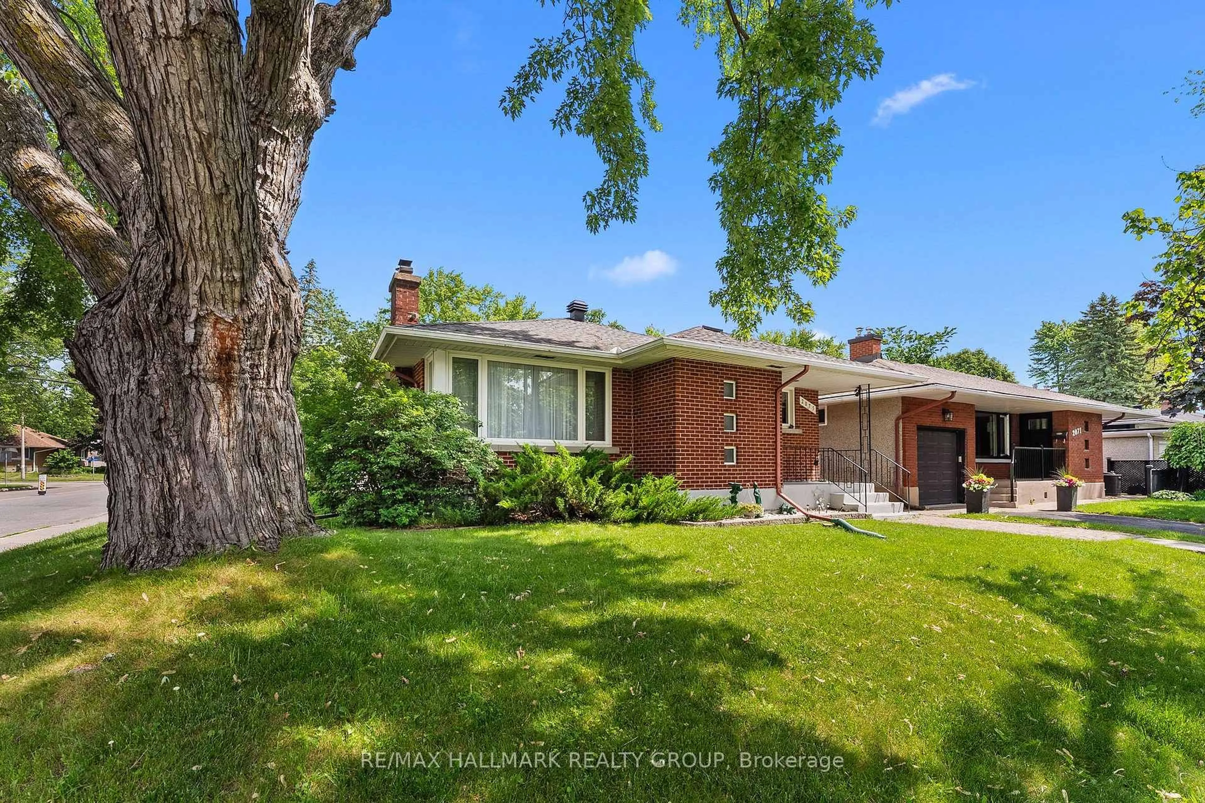 Home with brick exterior material, street for 2075 Neepawa Ave, Ottawa Ontario K2A 3L7