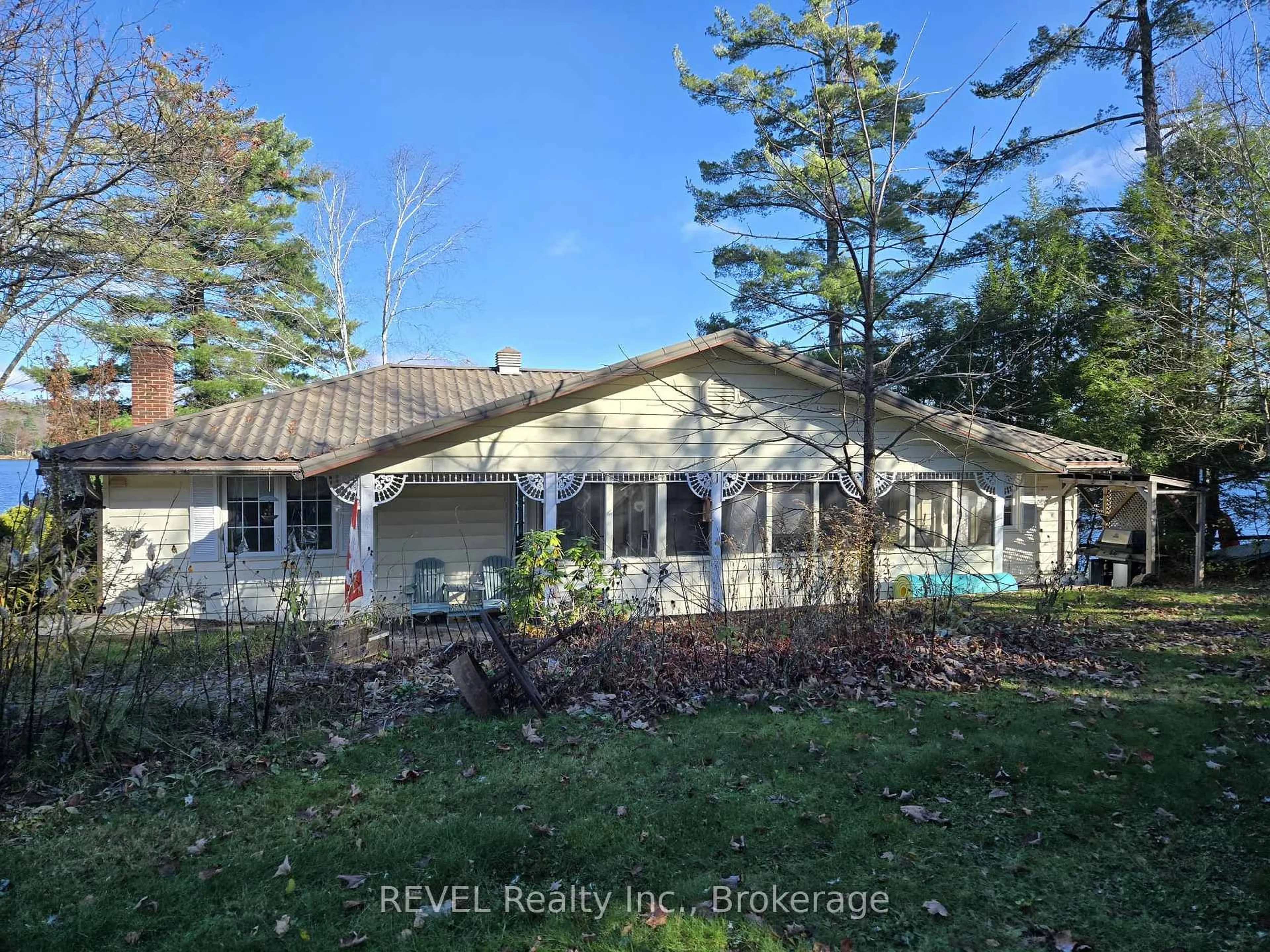 A pic from outside/outdoor area/front of a property/back of a property/a pic from drone, water/lake/river/ocean view for 1031 Butterfly Rd, Muskoka Lakes Ontario P0C 1A0