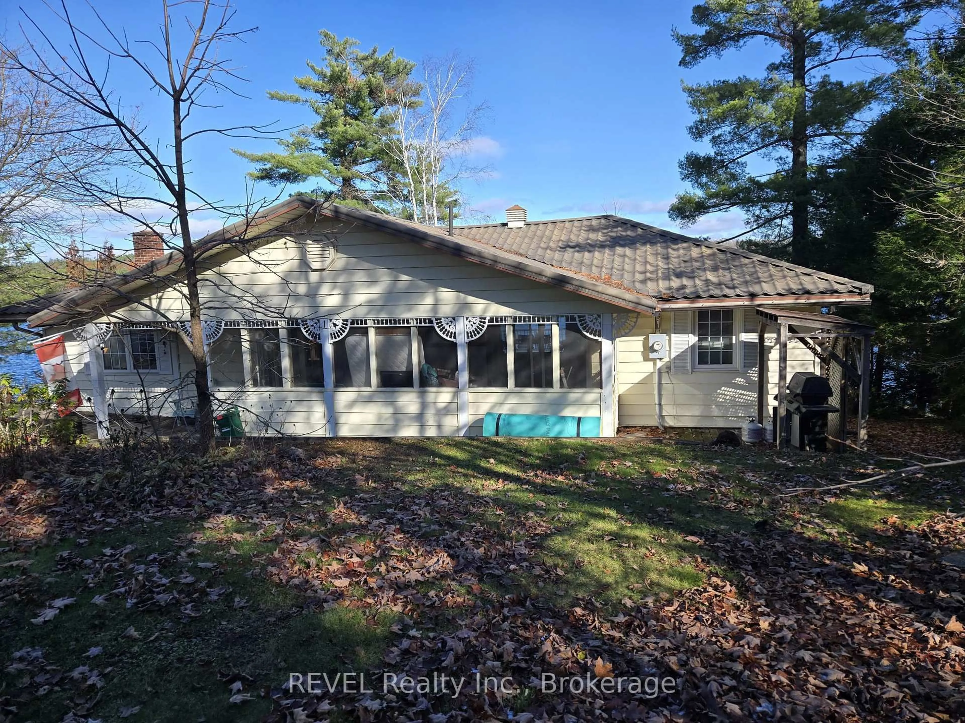 A pic from outside/outdoor area/front of a property/back of a property/a pic from drone, water/lake/river/ocean view for 1031 Butterfly Rd, Muskoka Lakes Ontario P0C 1A0
