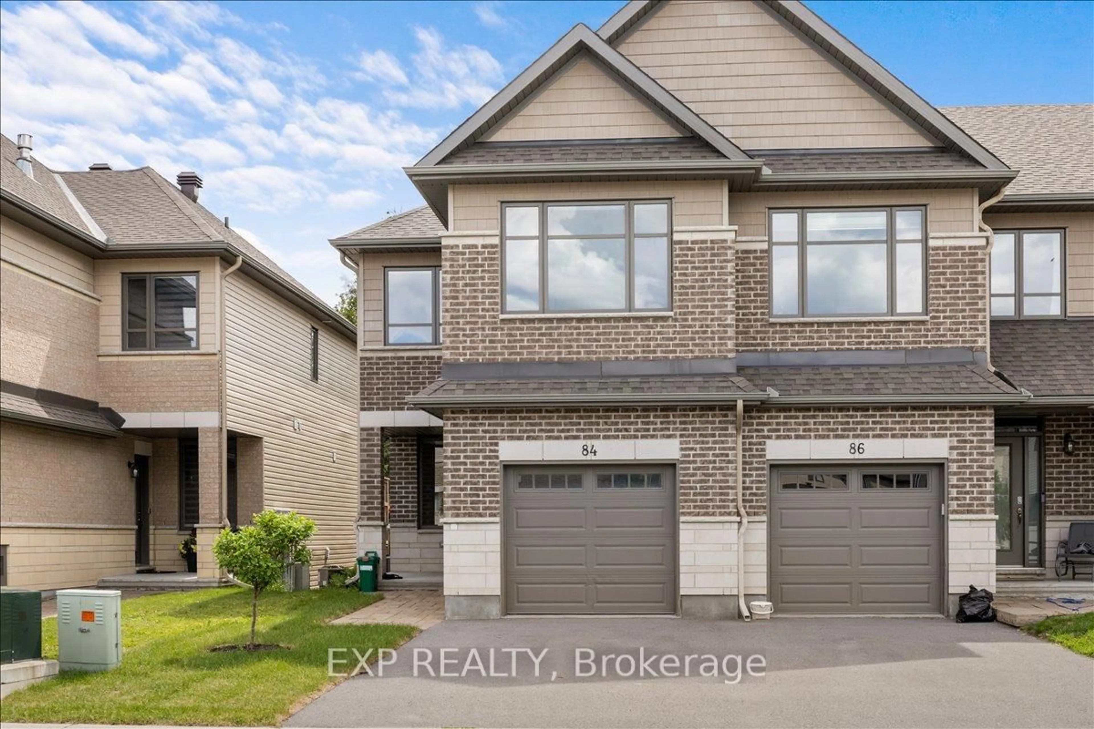 Home with brick exterior material, street for 84 Porter St, Stittsville Ontario K2S 2L8