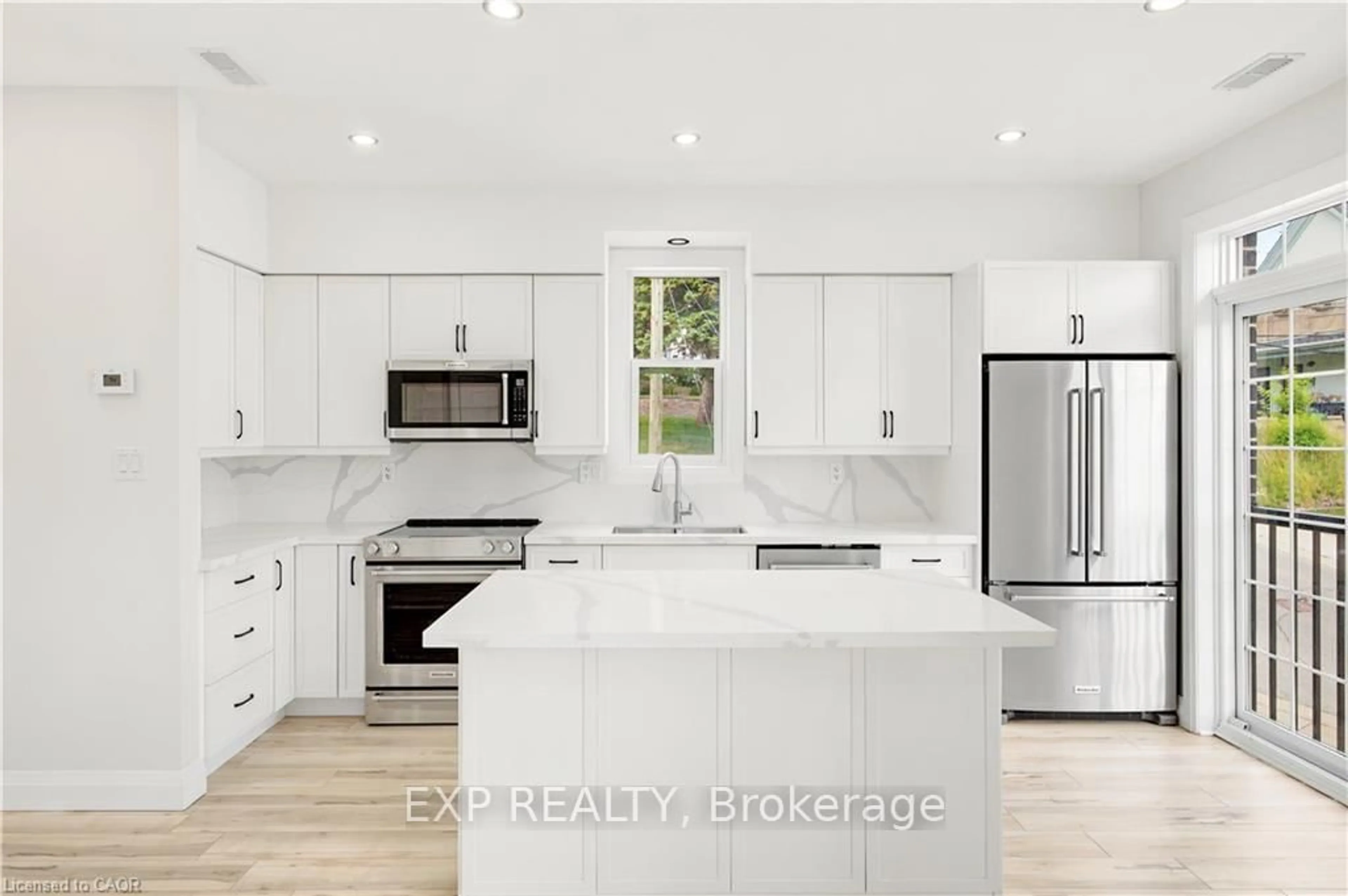 Open concept kitchen, ceramic/tile floor for 131 St George St, Kitchener Ontario N2G 2T2
