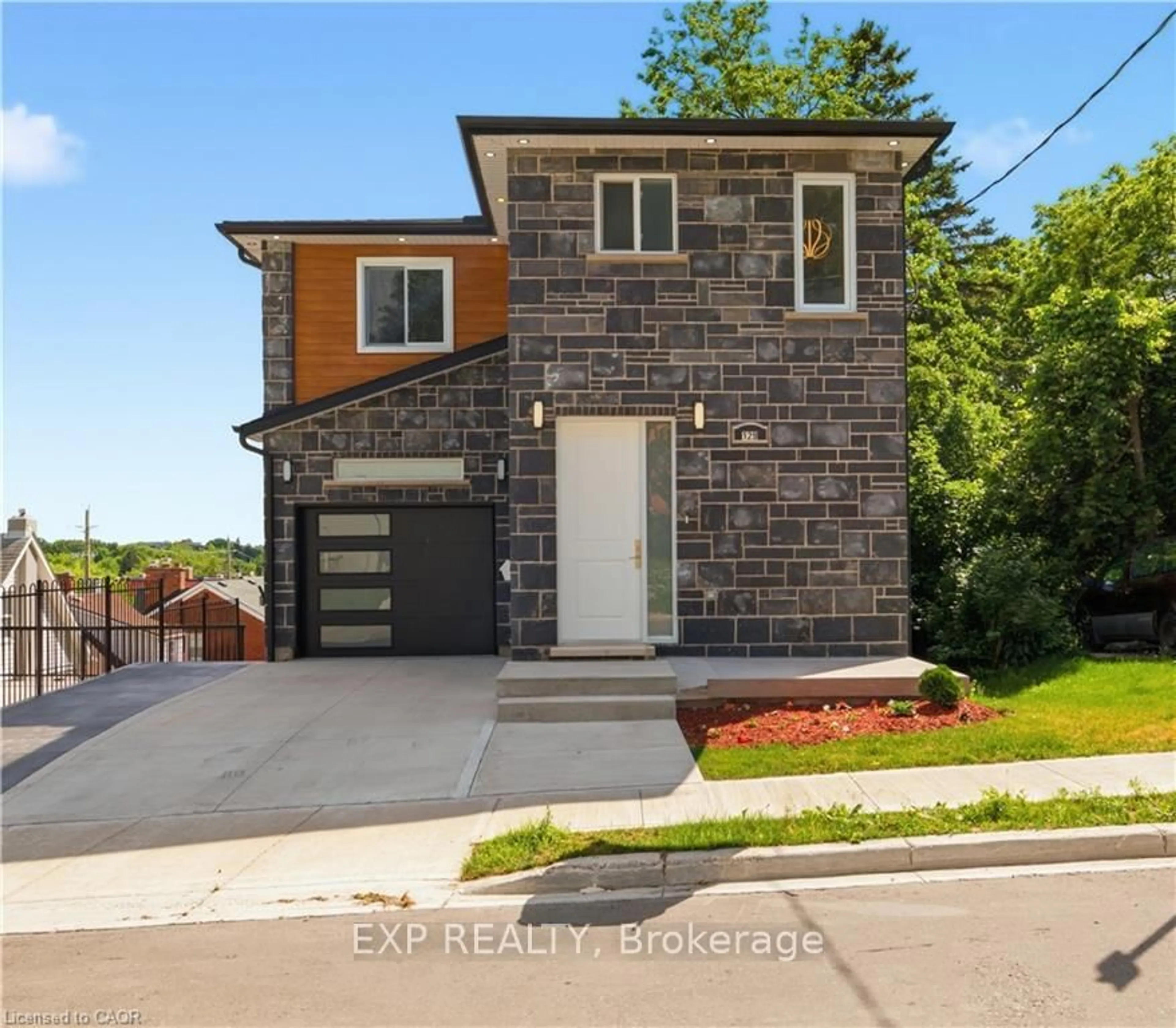 Home with brick exterior material, street for 129 St George St, Kitchener Ontario N2G 2T2