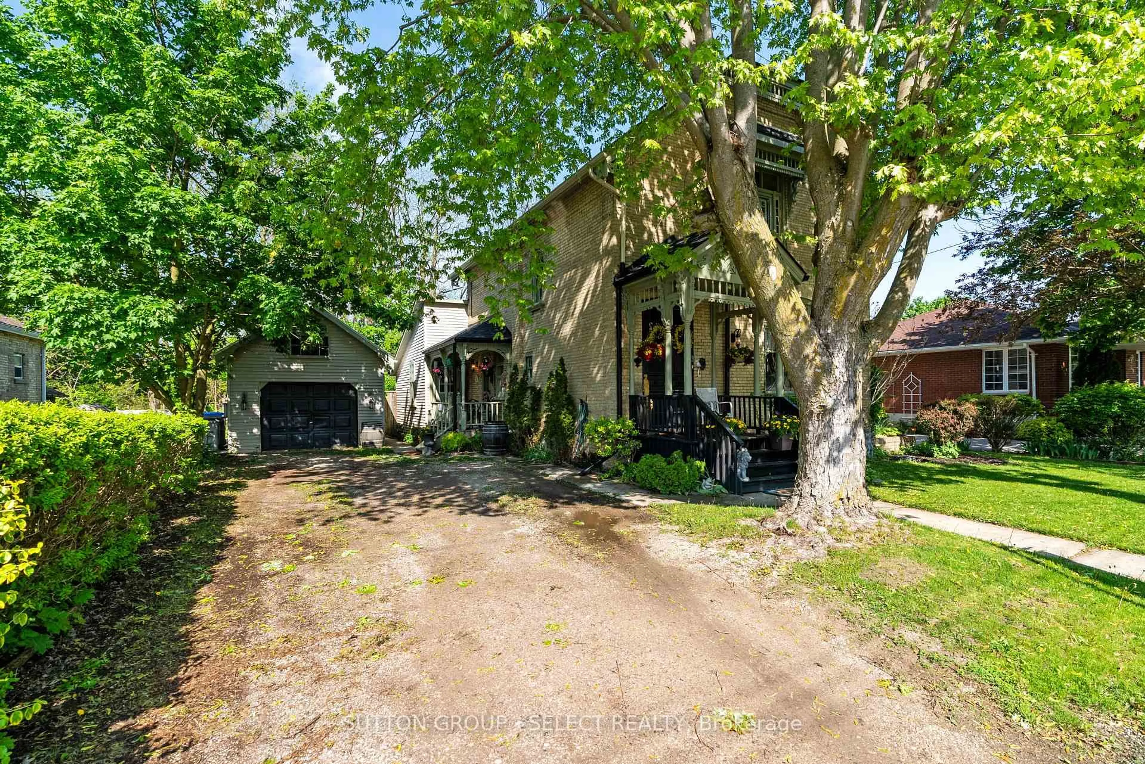 A pic from outside/outdoor area/front of a property/back of a property/a pic from drone, street for 365 William St, South Huron Ontario N0M 1S2