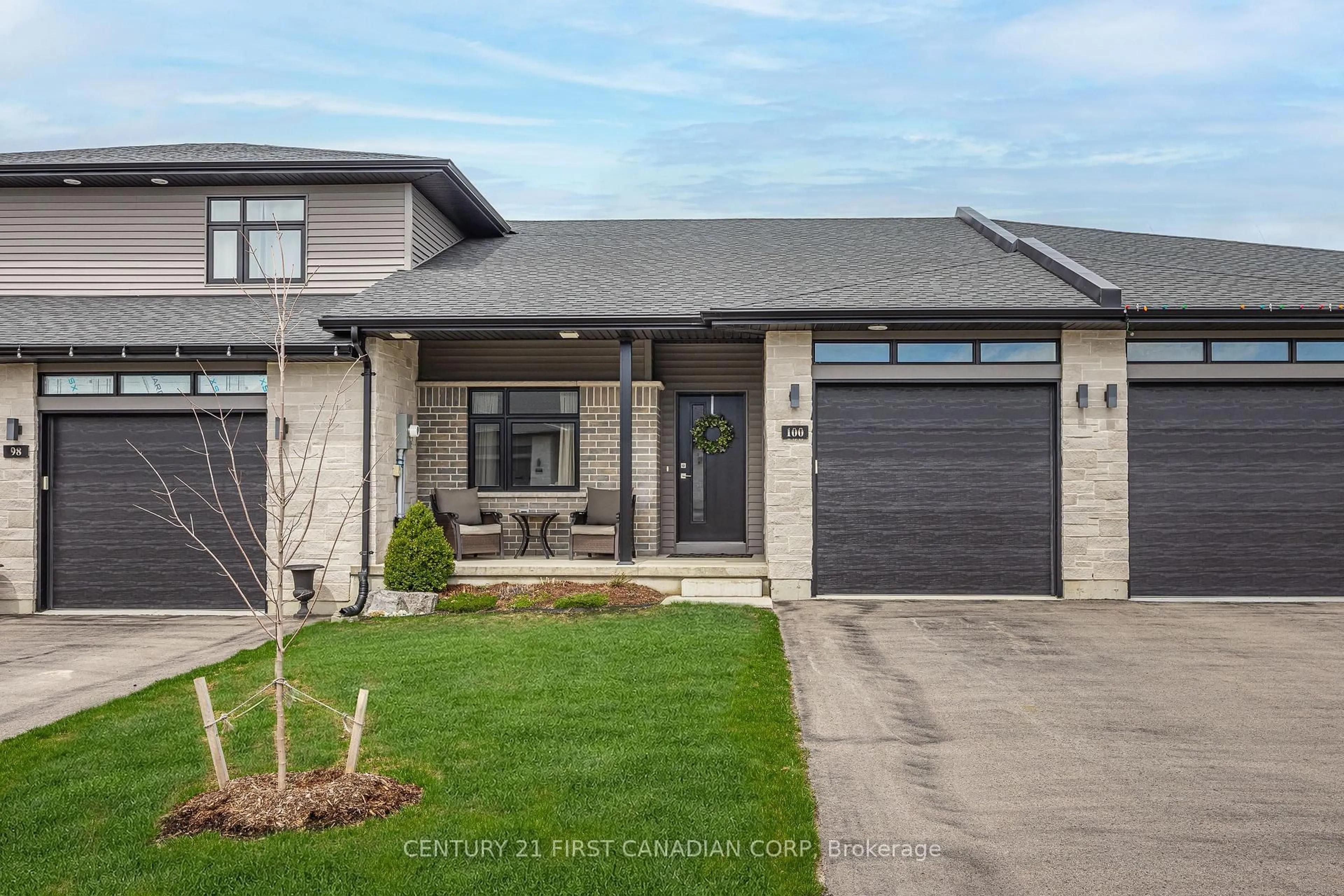 Home with brick exterior material, street for 100 Rowe Ave, South Huron Ontario N0M 1S1