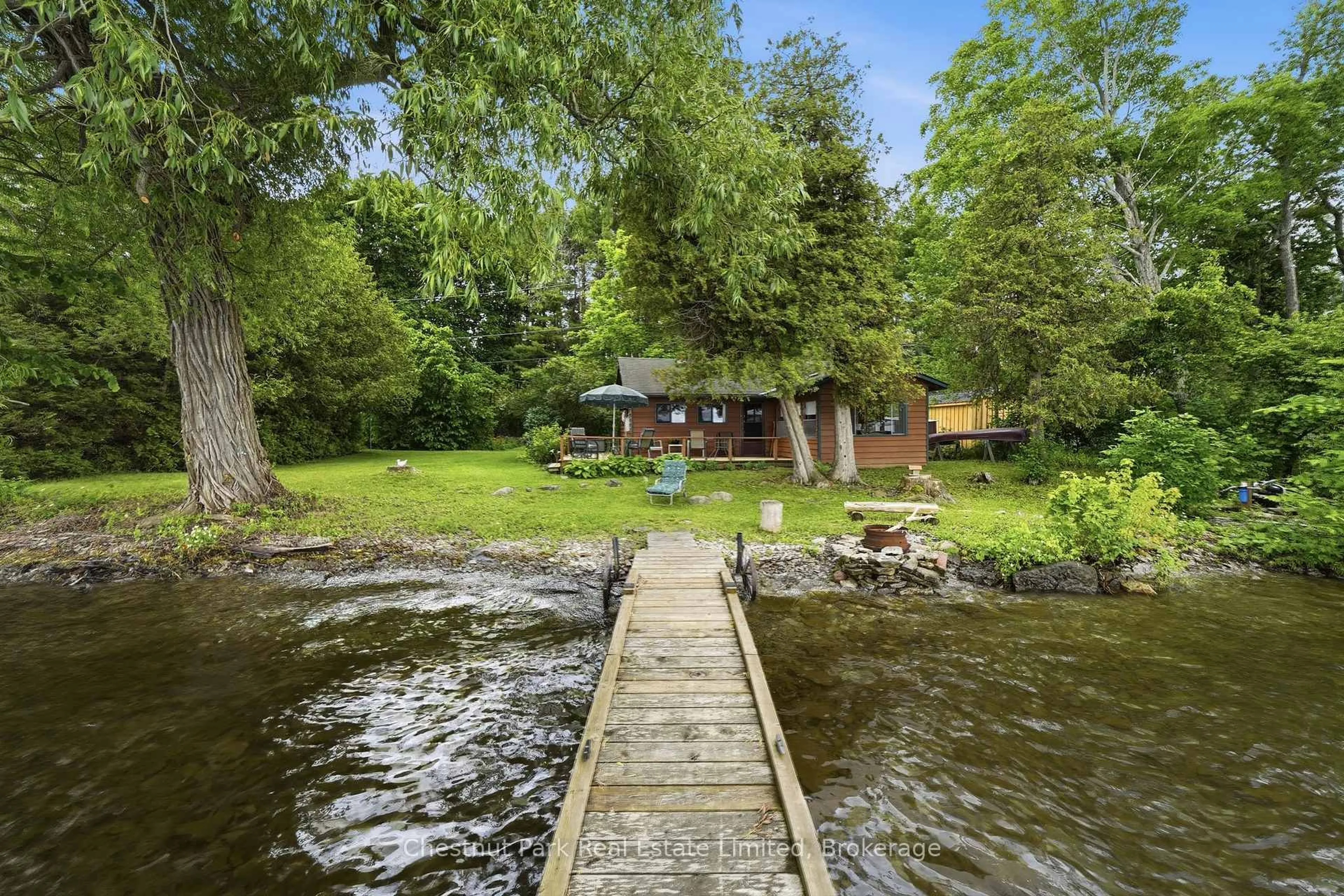 A pic from outside/outdoor area/front of a property/back of a property/a pic from drone, water/lake/river/ocean view for 22 Bongards Lane, Prince Edward County Ontario K0K 2T0