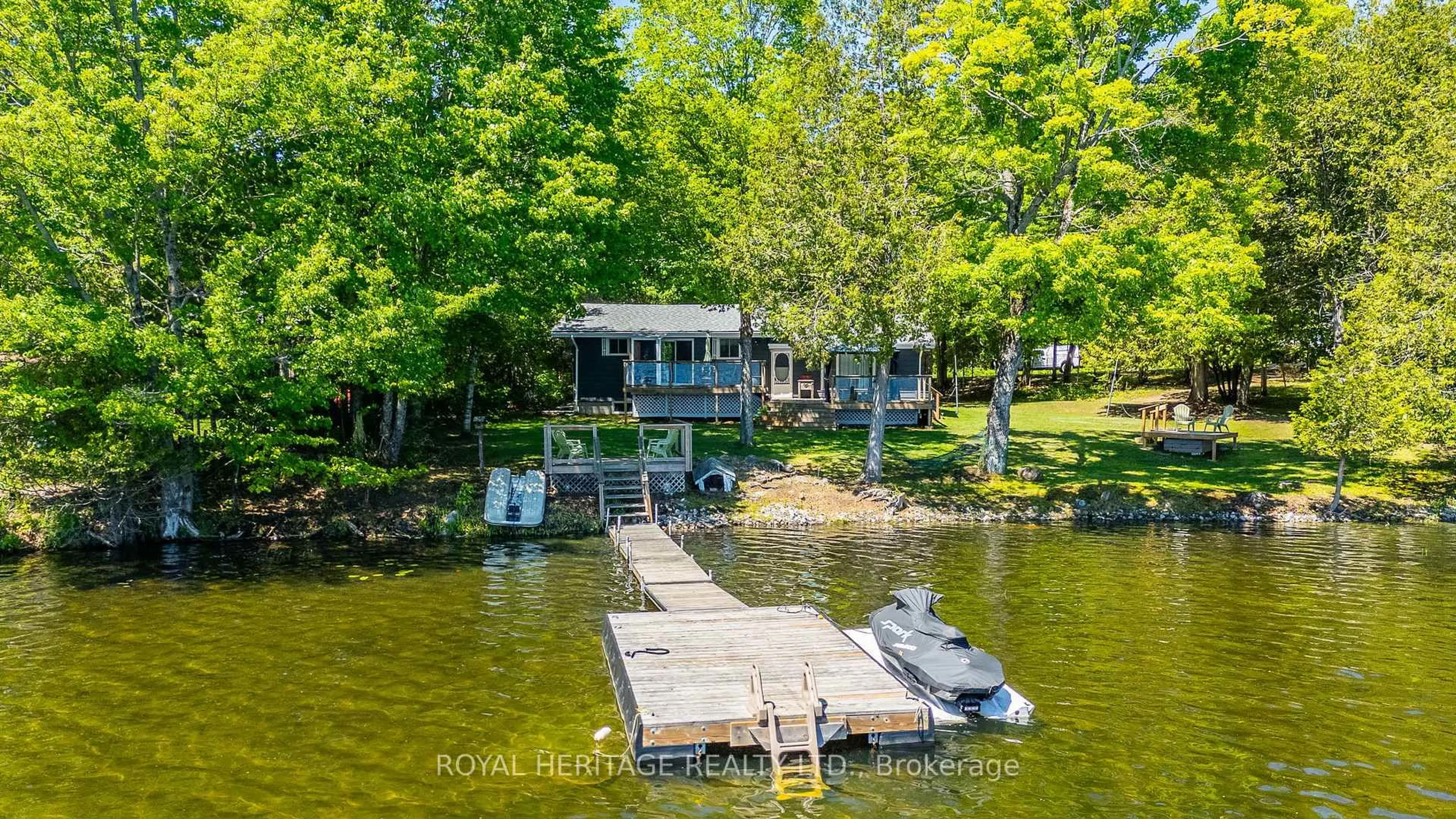 A pic from outside/outdoor area/front of a property/back of a property/a pic from drone, water/lake/river/ocean view for 1582 Hospitality Rd, Minden Hills Ontario K0M 2K0