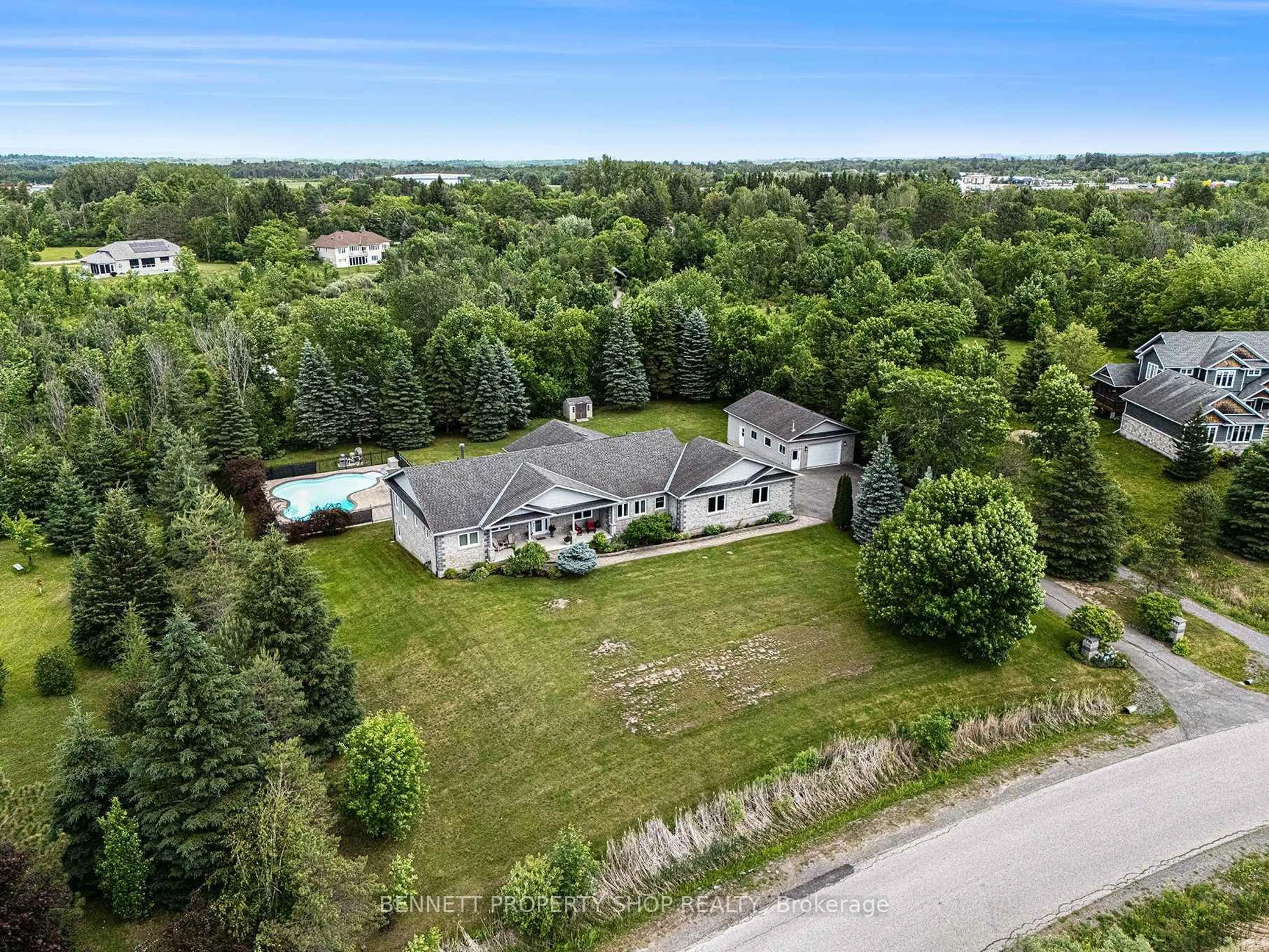 A pic from outside/outdoor area/front of a property/back of a property/a pic from drone, unknown for 121 Covered Bridge Way, Carp Ontario K0A 1L0