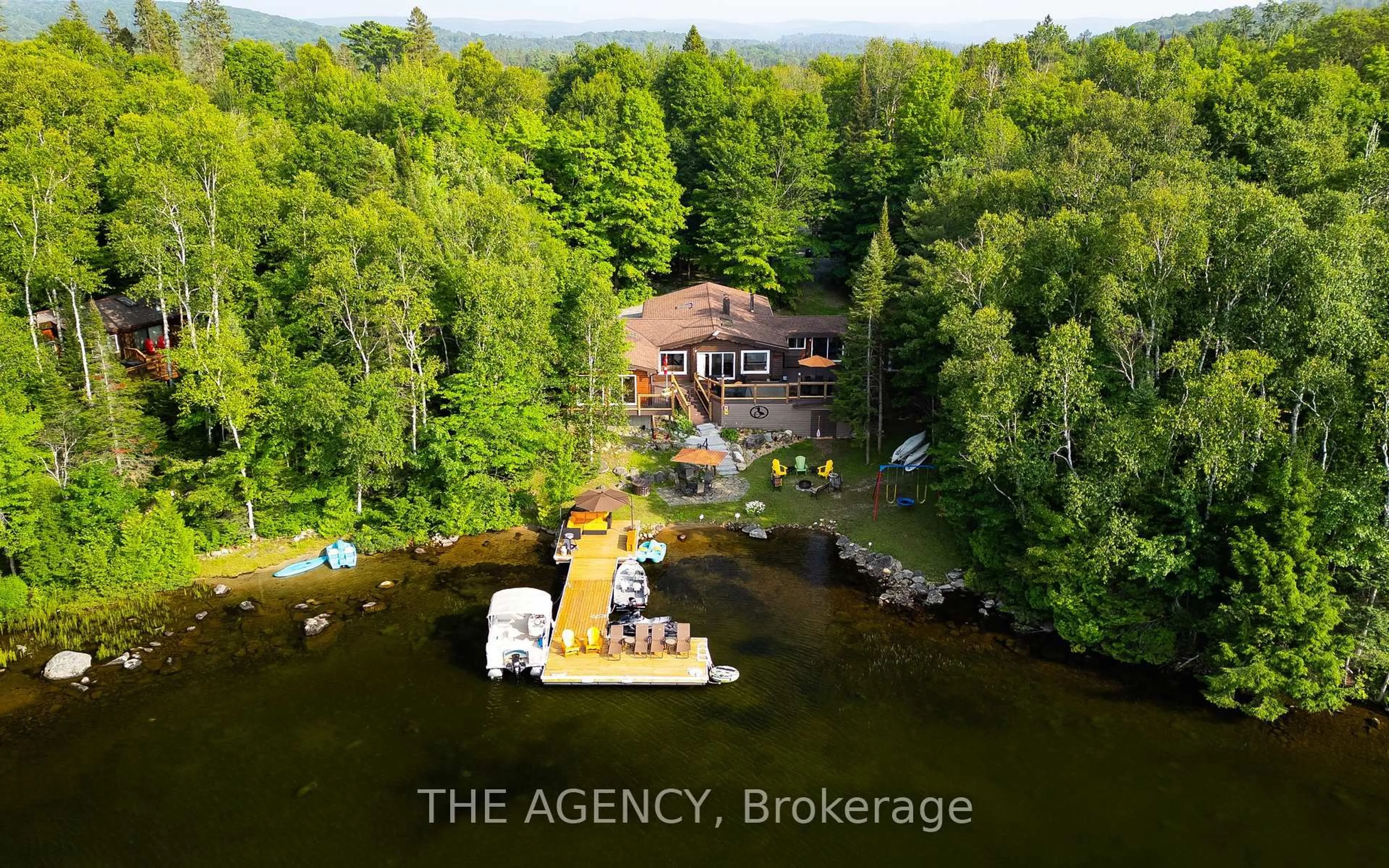A pic from outside/outdoor area/front of a property/back of a property/a pic from drone, water/lake/river/ocean view for 57 Lake Haven Dr, Kearney Ontario P0A 1Z0