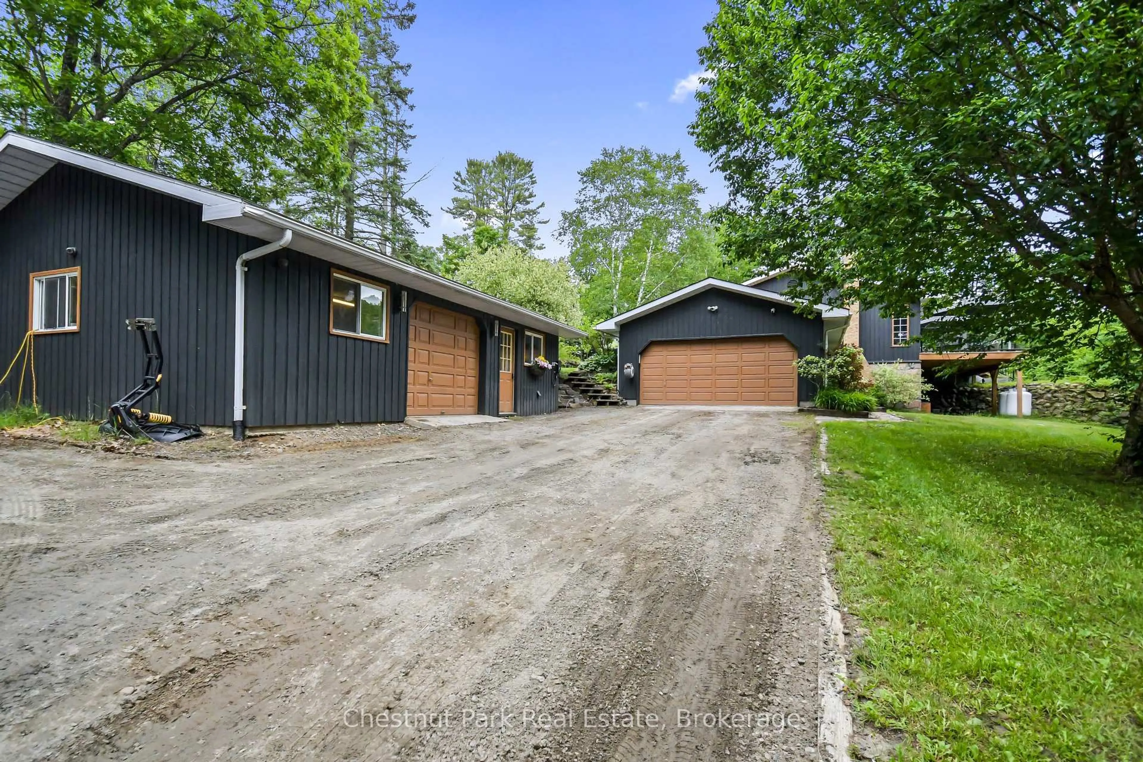 A pic from outside/outdoor area/front of a property/back of a property/a pic from drone, unknown for 802 Williamsport Rd, Huntsville Ontario P1H 2J4