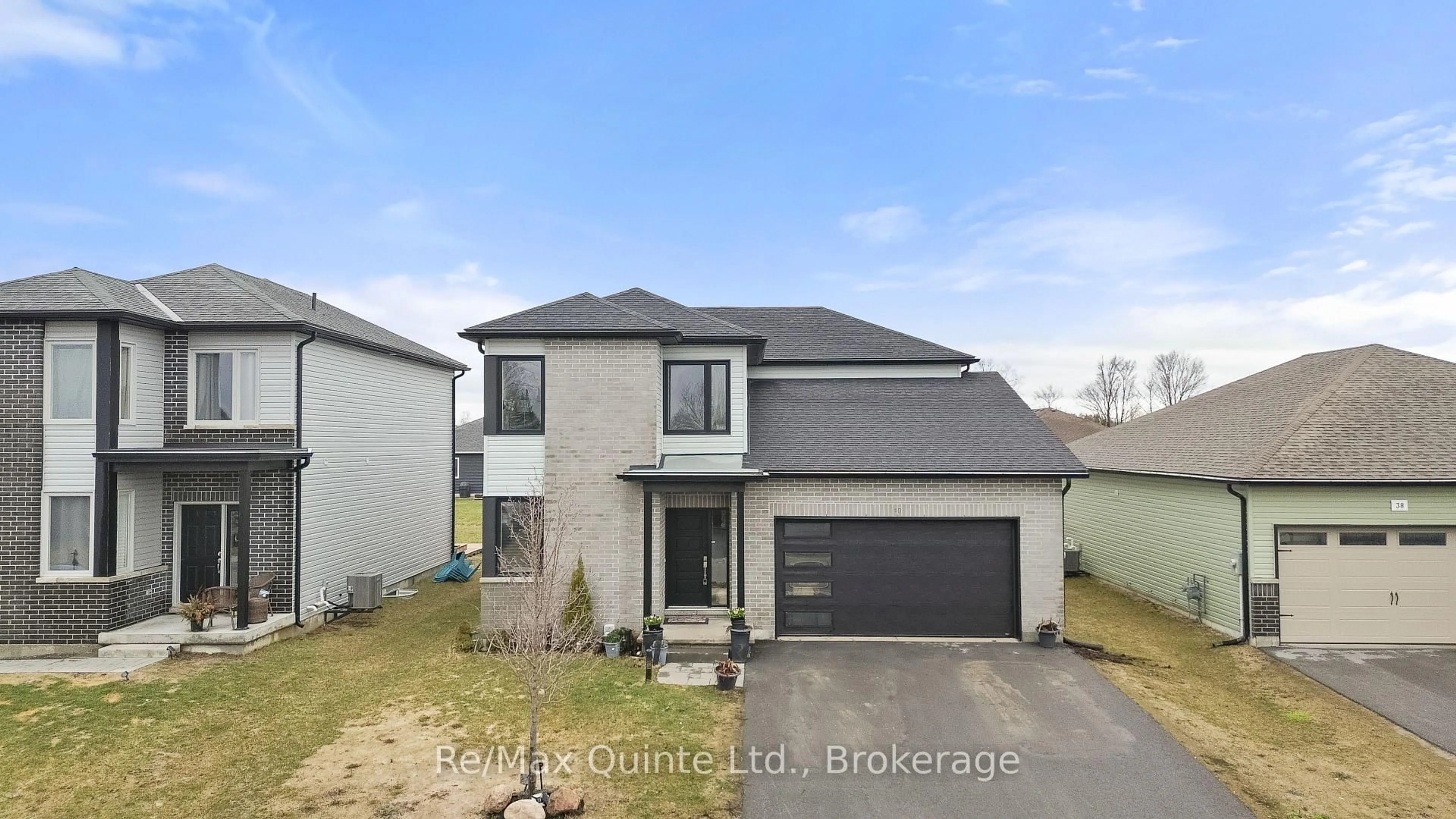Home with brick exterior material, street for 40 Allen St, Prince Edward County Ontario K0K 2T0