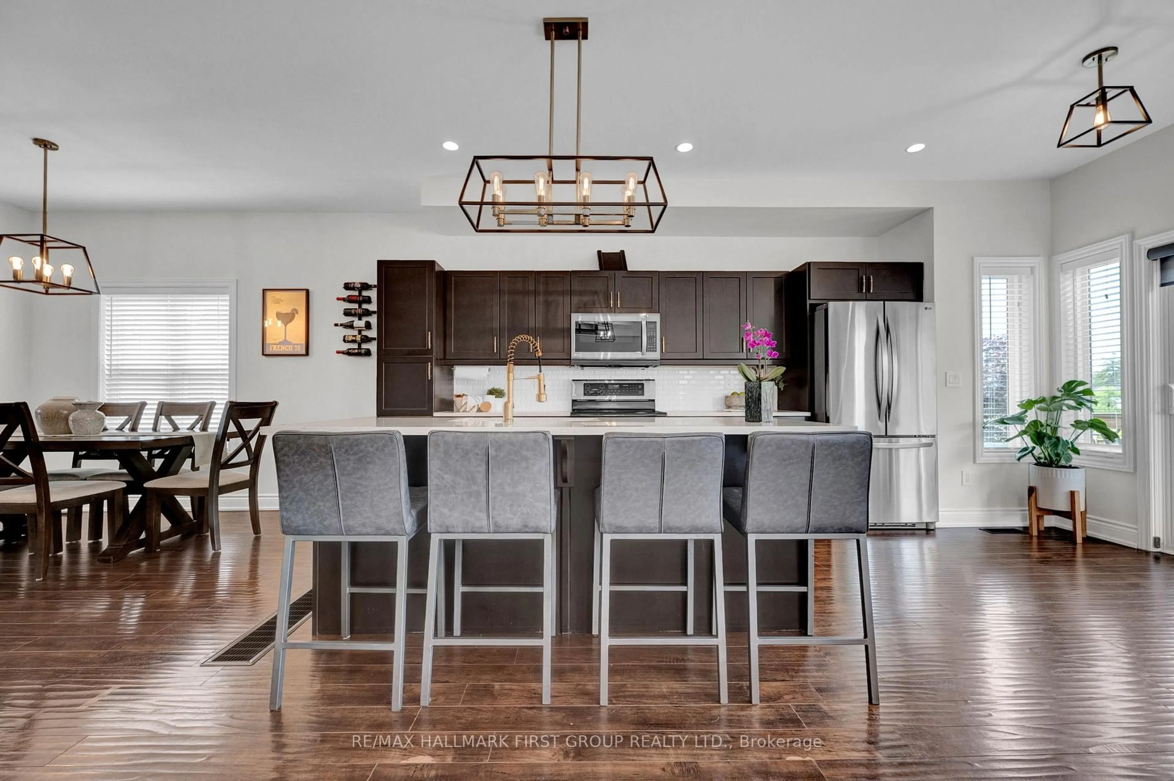 Open concept kitchen, wood/laminate floor for 243 Rollings St, Cobourg Ontario K9A 0G8