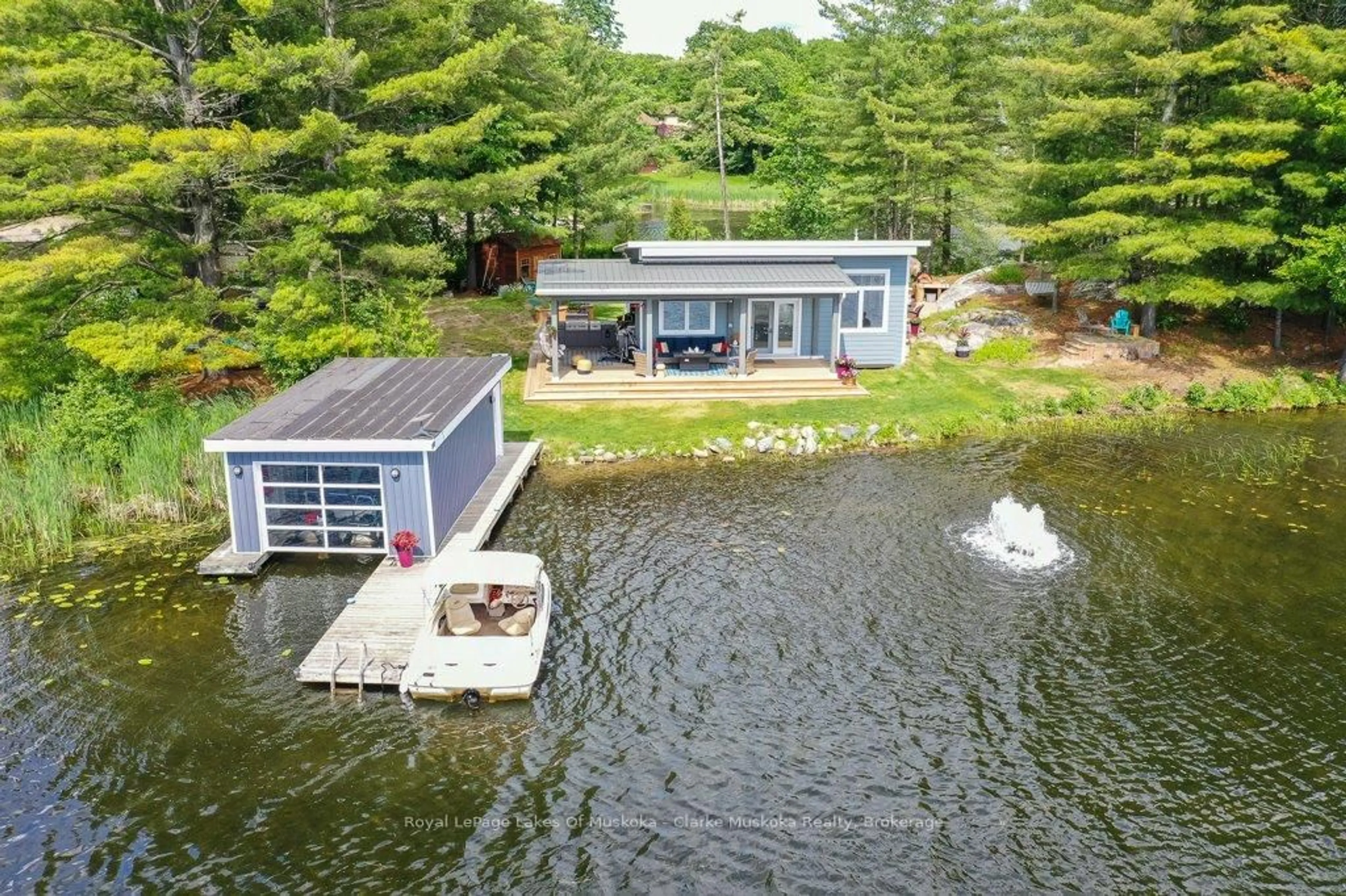 A pic from outside/outdoor area/front of a property/back of a property/a pic from drone, water/lake/river/ocean view for 2 Island 60, Georgian Bay Ontario L0K 1S0