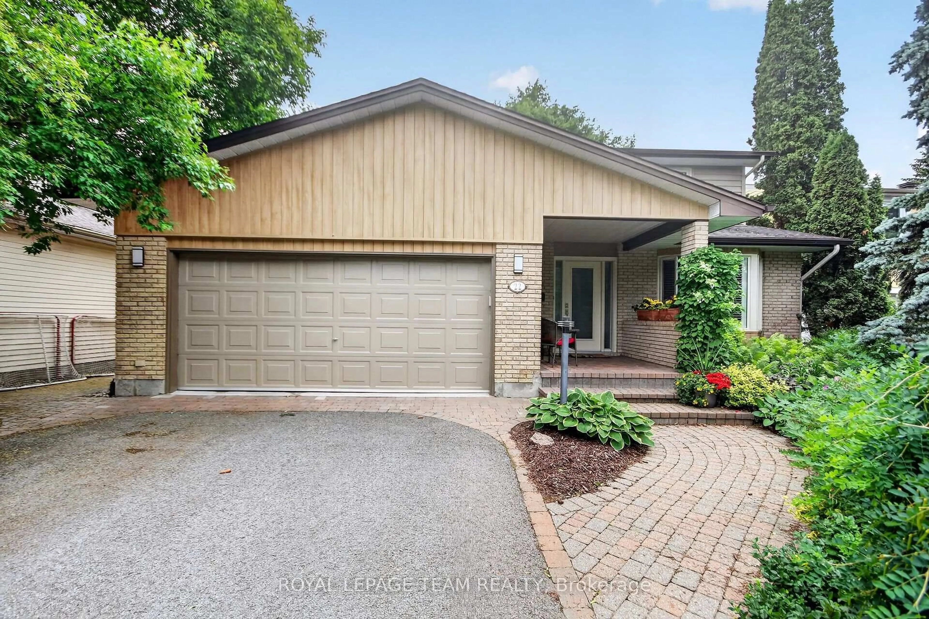 Home with brick exterior material, street for 22 Lynhurst Ave, Ottawa Ontario K1V 9W7