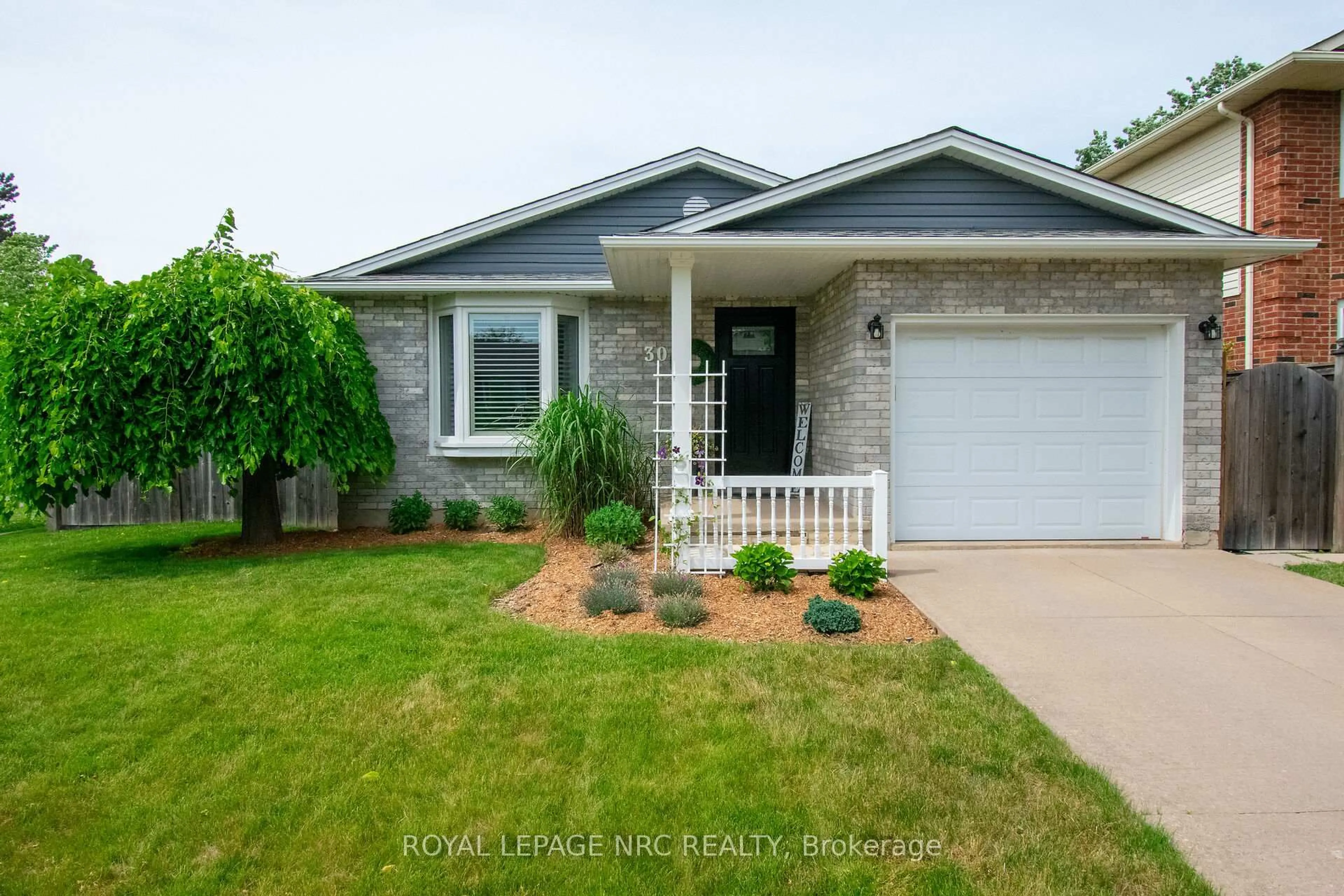 Home with vinyl exterior material, street for 30 Elderwood Dr, St. Catharines Ontario L2S 3E5