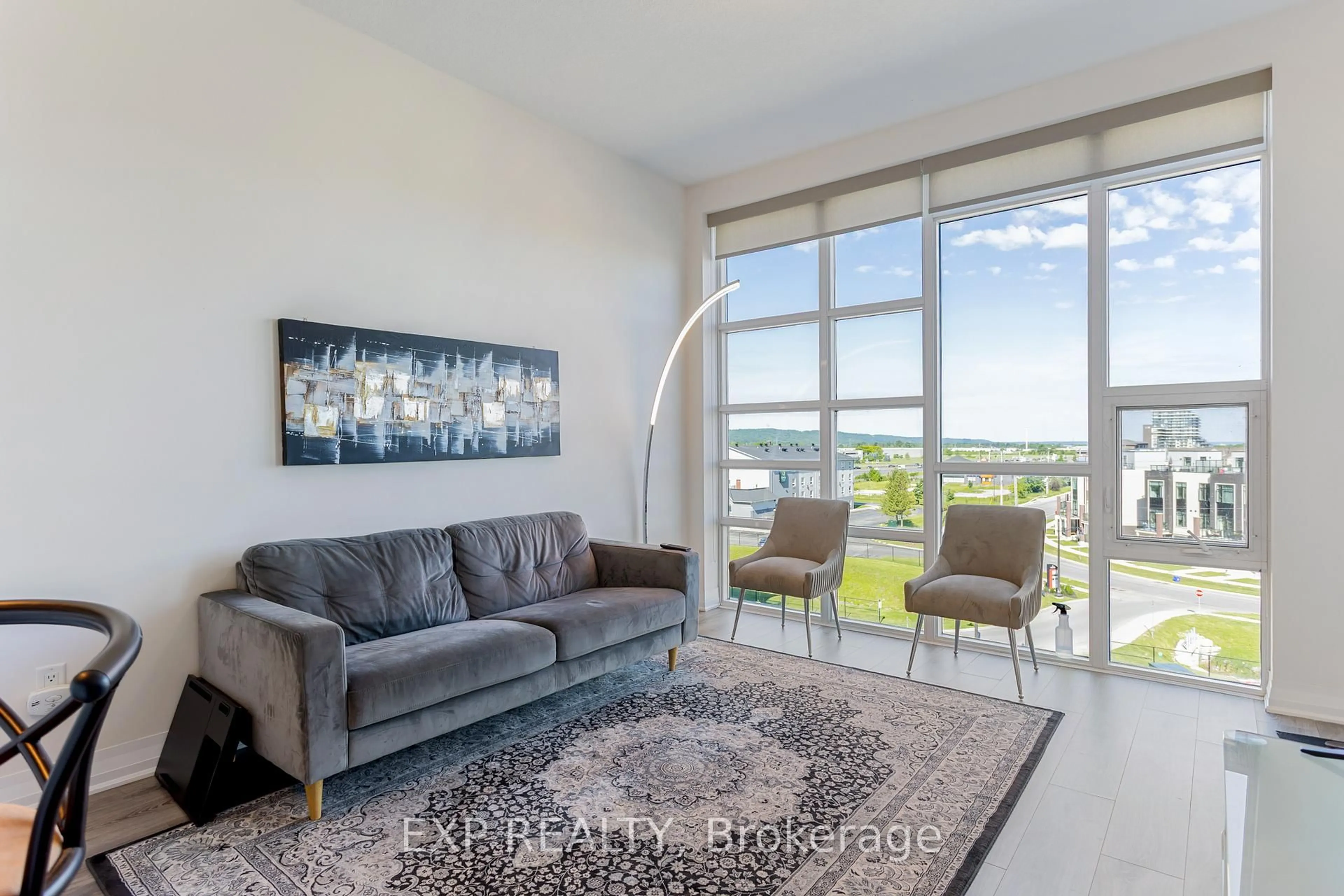 Living room with furniture, unknown for 10 Concord Pl #504, Grimsby Ontario L3M 0G6