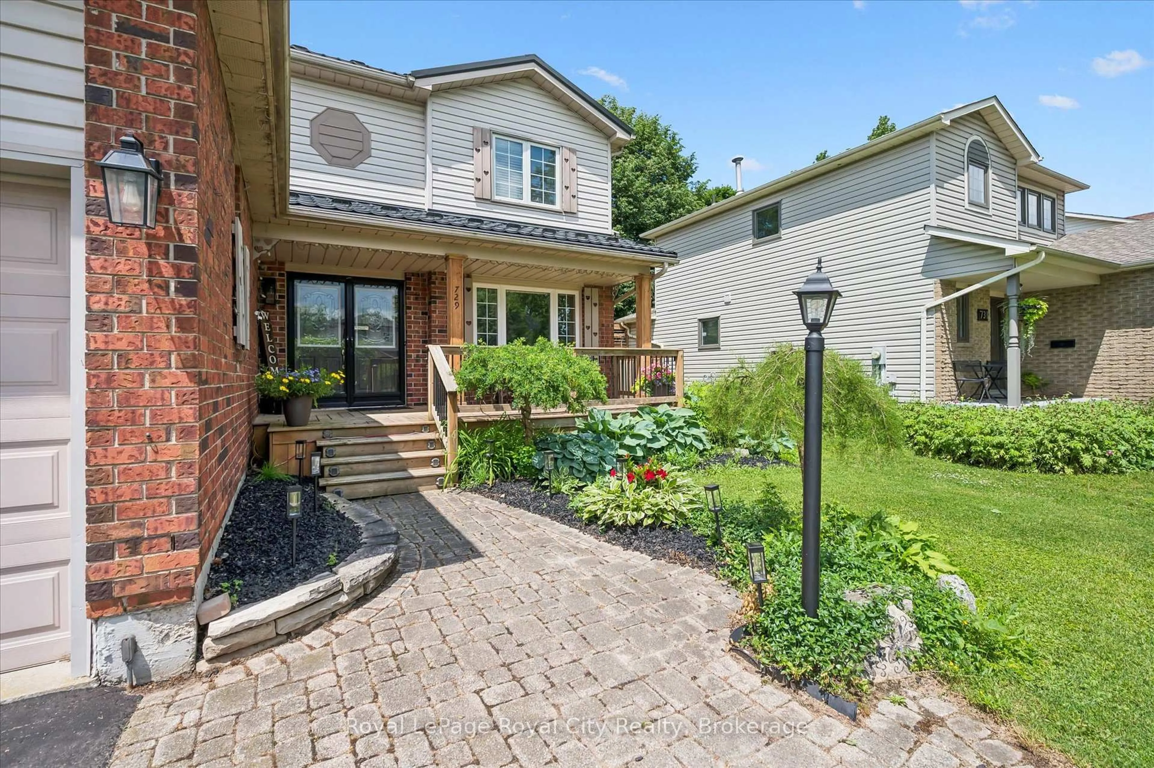 Home with brick exterior material, street for 729 WOODHILL Dr, Centre Wellington Ontario N1M 3M8