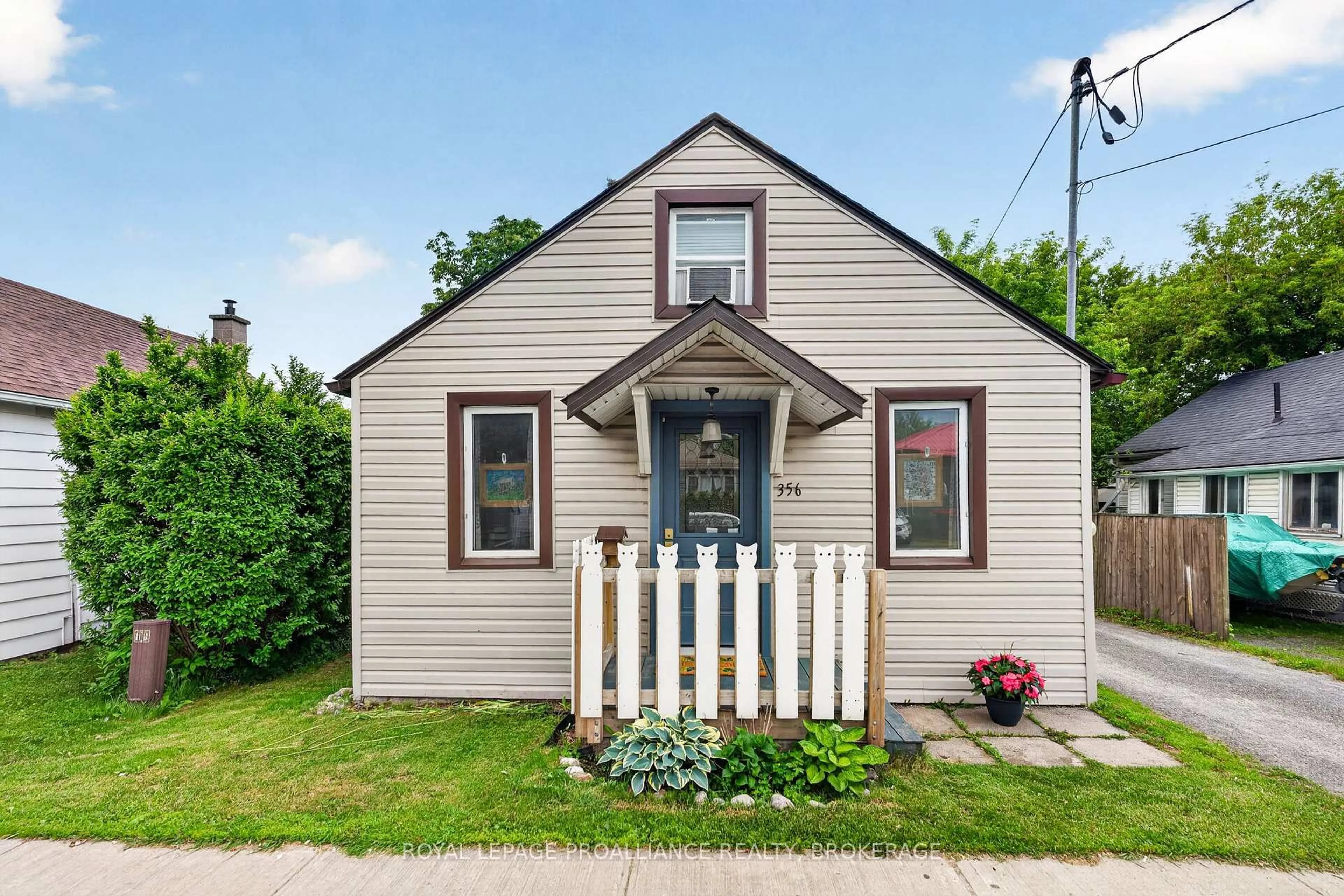 Home with vinyl exterior material, street for 356 Elliott Ave, Kingston Ontario K7K 2R5