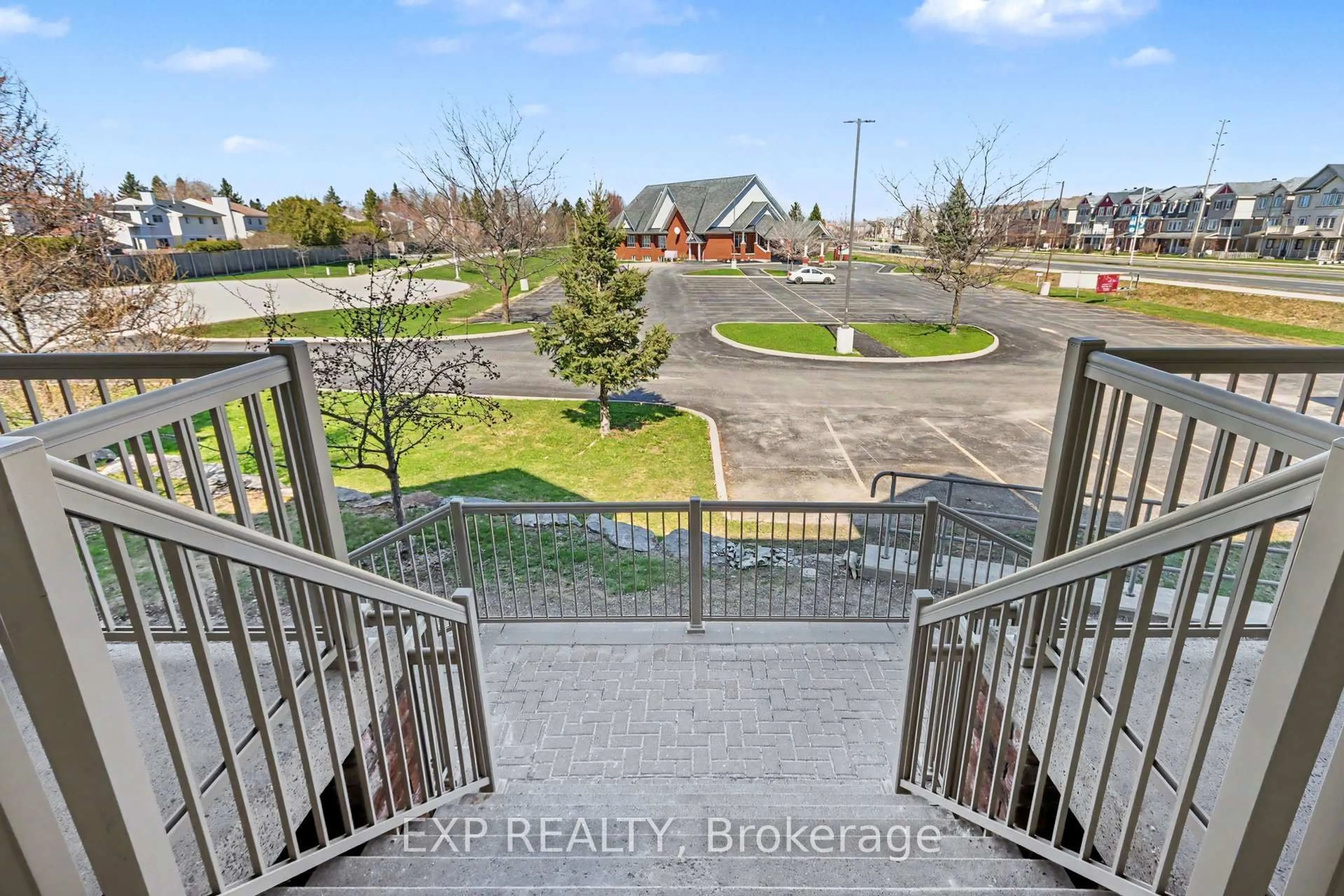 A pic from outside/outdoor area/front of a property/back of a property/a pic from drone, city buildings view from balcony for 135 Harthill Way #J, Ottawa Ontario K2J 5V1