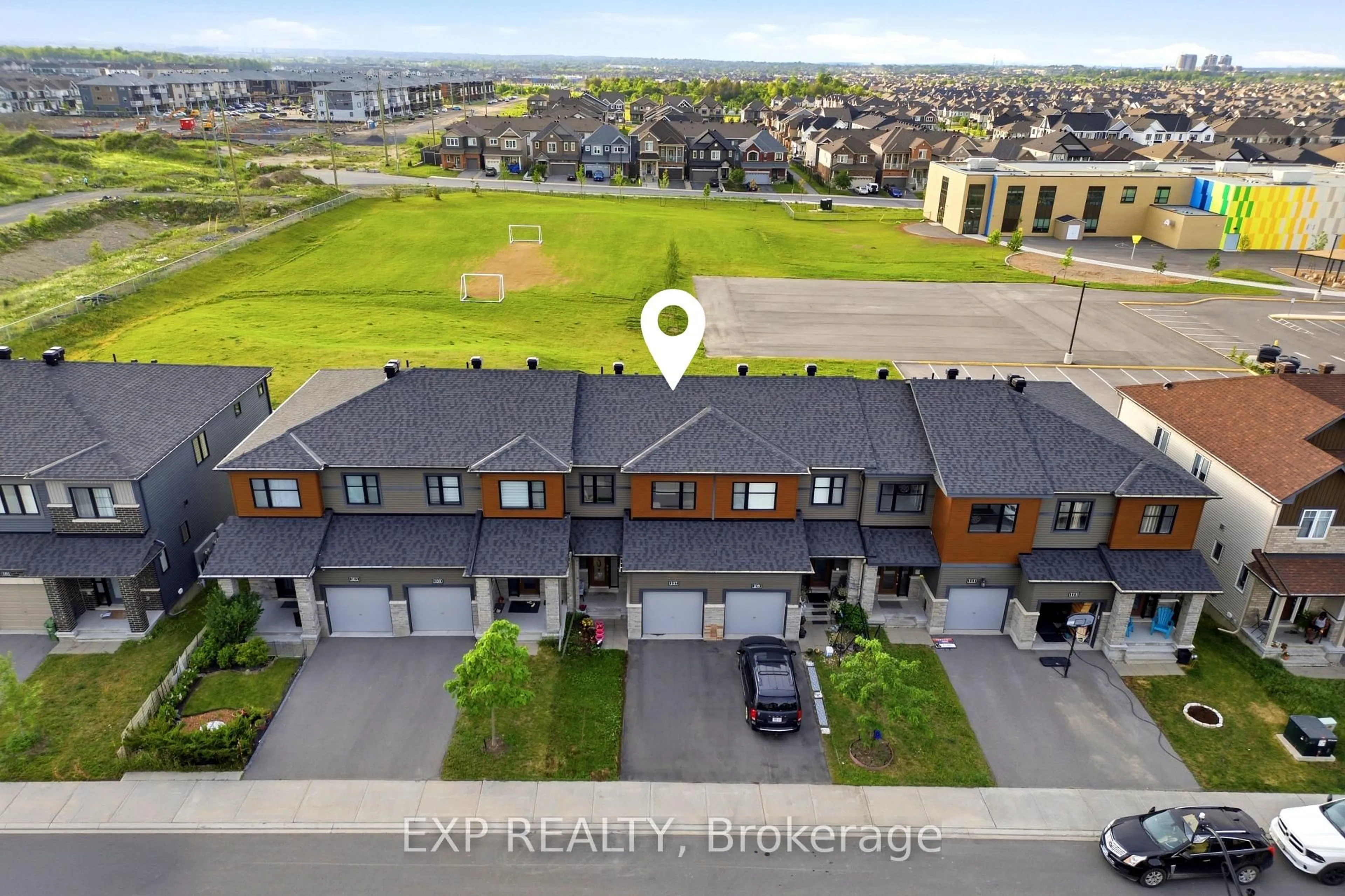 A pic from outside/outdoor area/front of a property/back of a property/a pic from drone, street for 107 Teelin Circ, Ottawa Ontario K2J 6T8