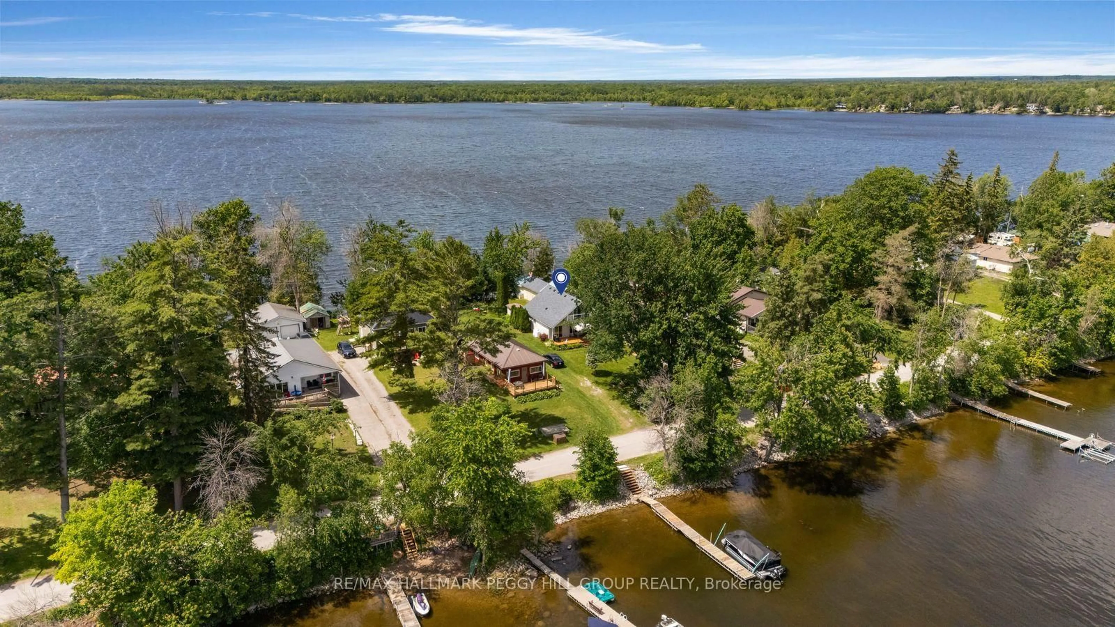 A pic from outside/outdoor area/front of a property/back of a property/a pic from drone, water/lake/river/ocean view for 329 Avery Point Rd, Kawartha Lakes Ontario L0K 1W0