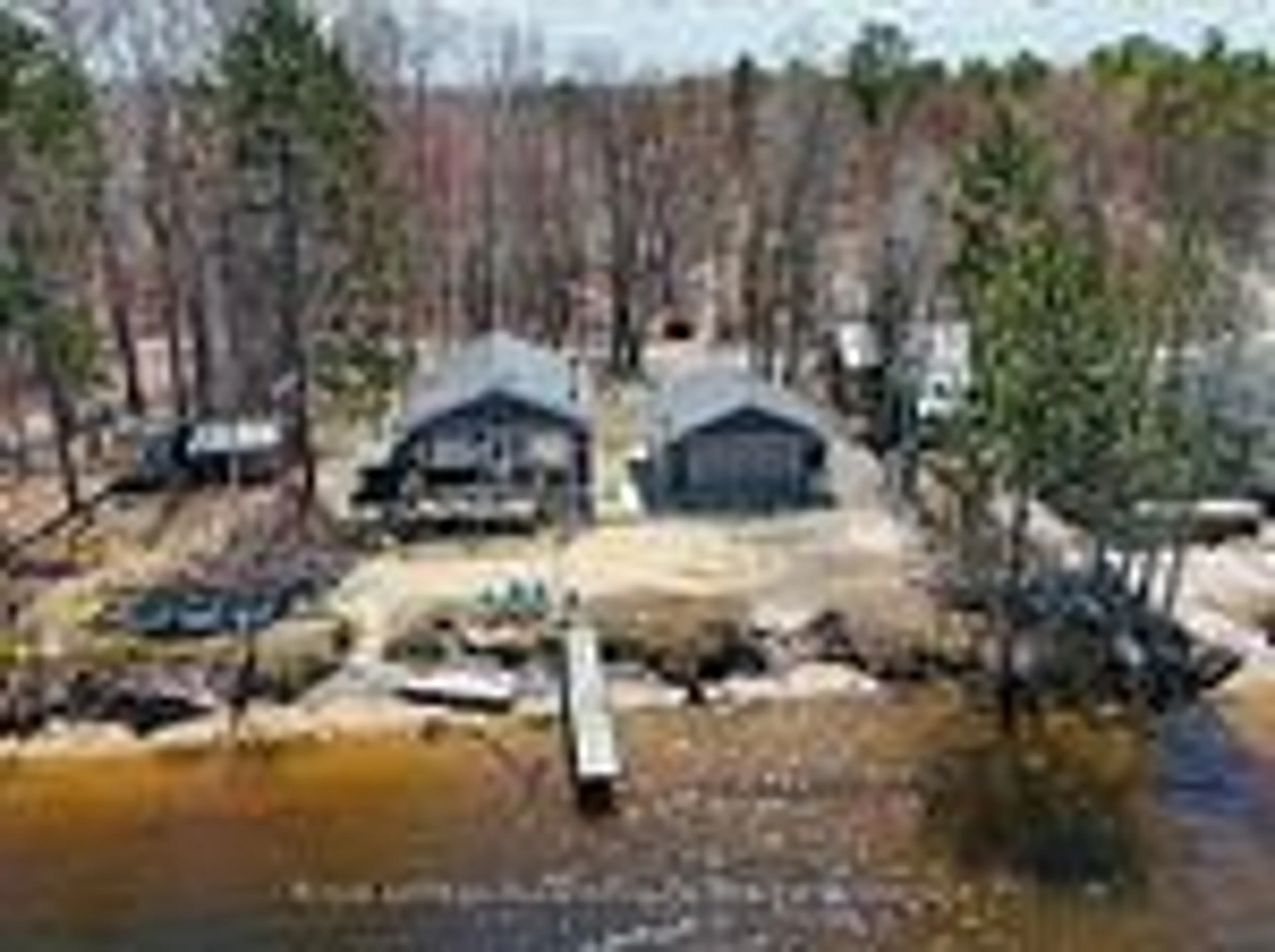 A pic from outside/outdoor area/front of a property/back of a property/a pic from drone, water/lake/river/ocean view for 405 Bear Creek Rd, Nipissing Ontario P0H 1H0
