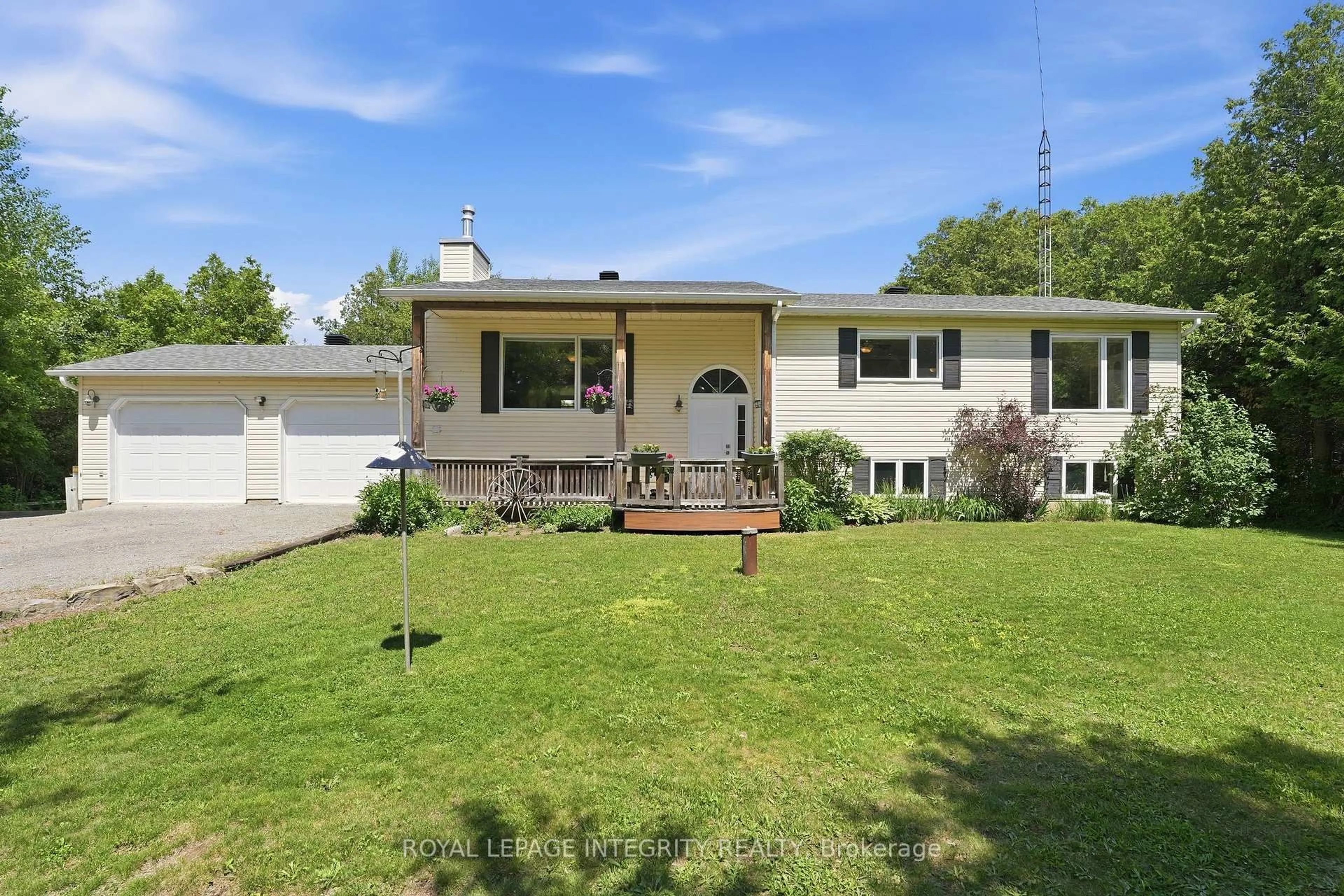 Home with vinyl exterior material, street for 215 Davis Rd, North Grenville Ontario K0G 1N0