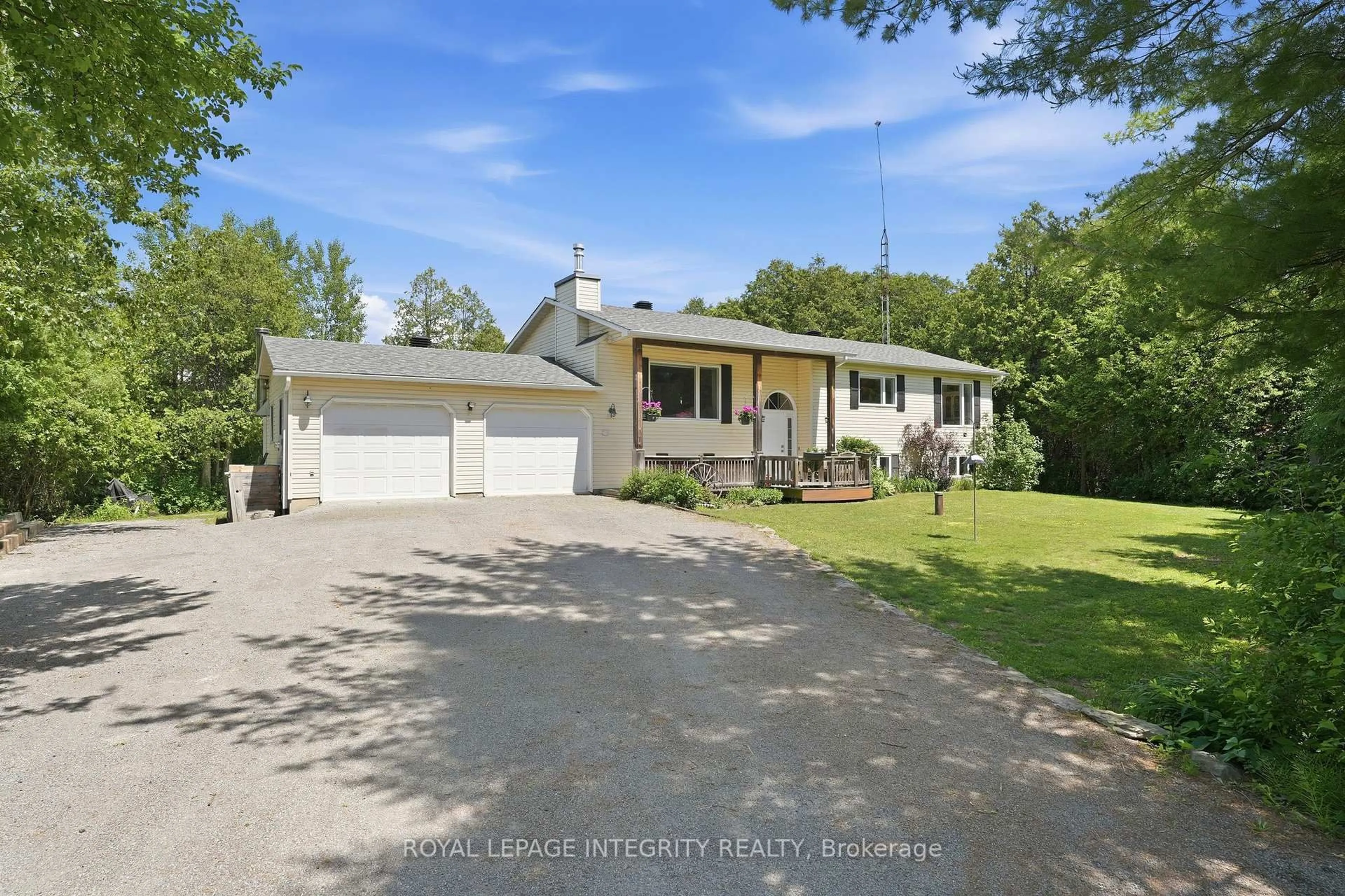 A pic from outside/outdoor area/front of a property/back of a property/a pic from drone, street for 215 Davis Rd, North Grenville Ontario K0G 1N0