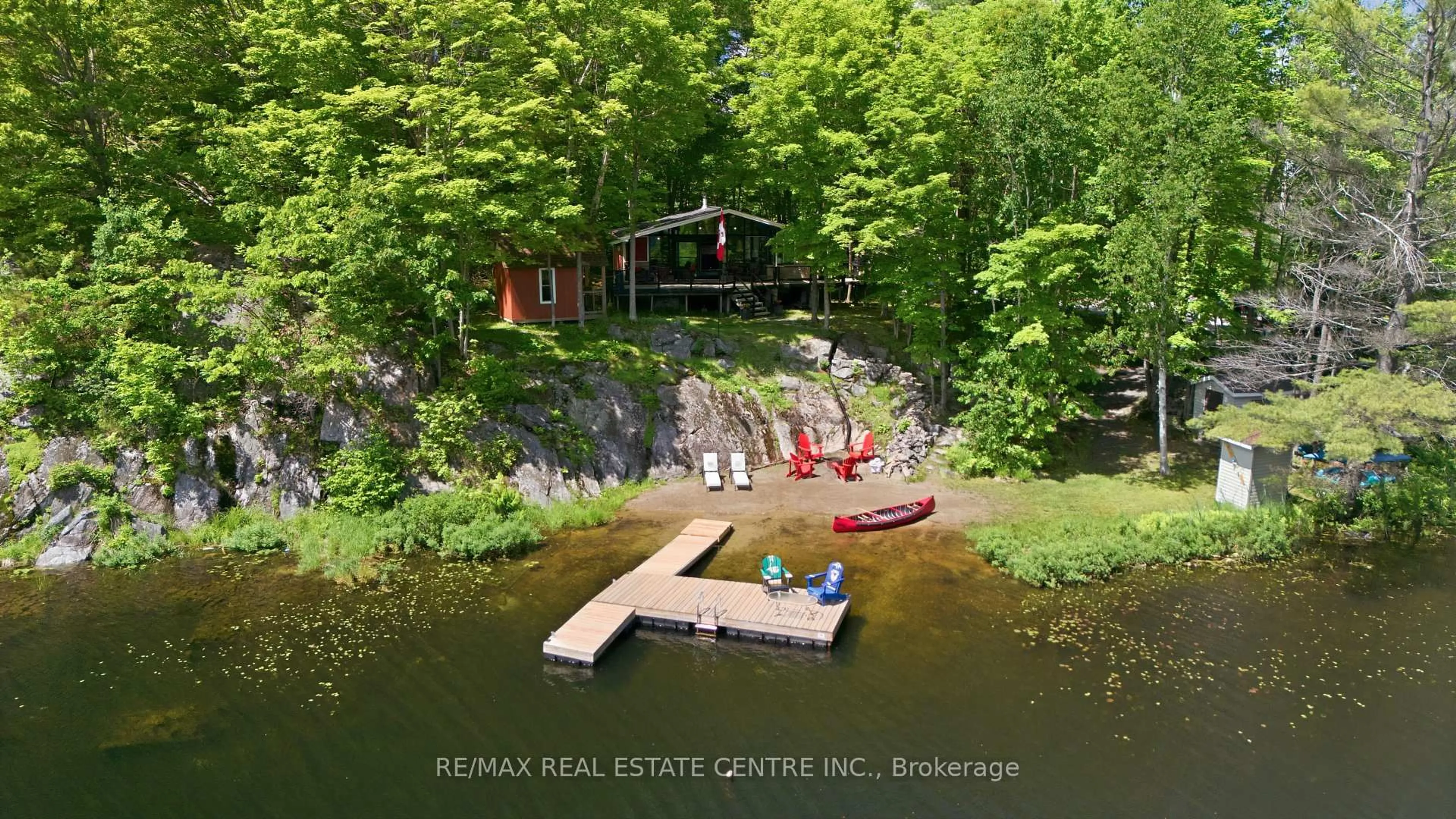 A pic from outside/outdoor area/front of a property/back of a property/a pic from drone, water/lake/river/ocean view for 87 Pinewood Rd, McDougall Ontario P2A 2W7