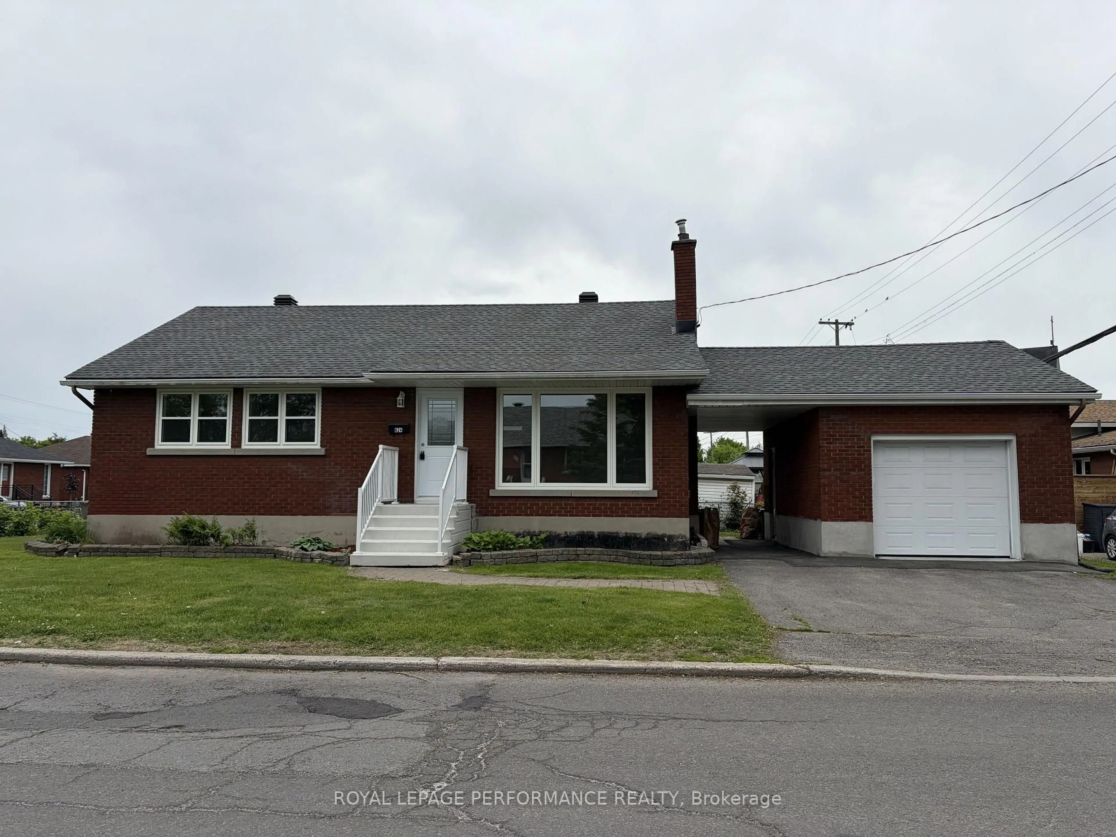 Home with brick exterior material, street for 624 Clarke Ave, Ottawa Ontario K1K 0Y7