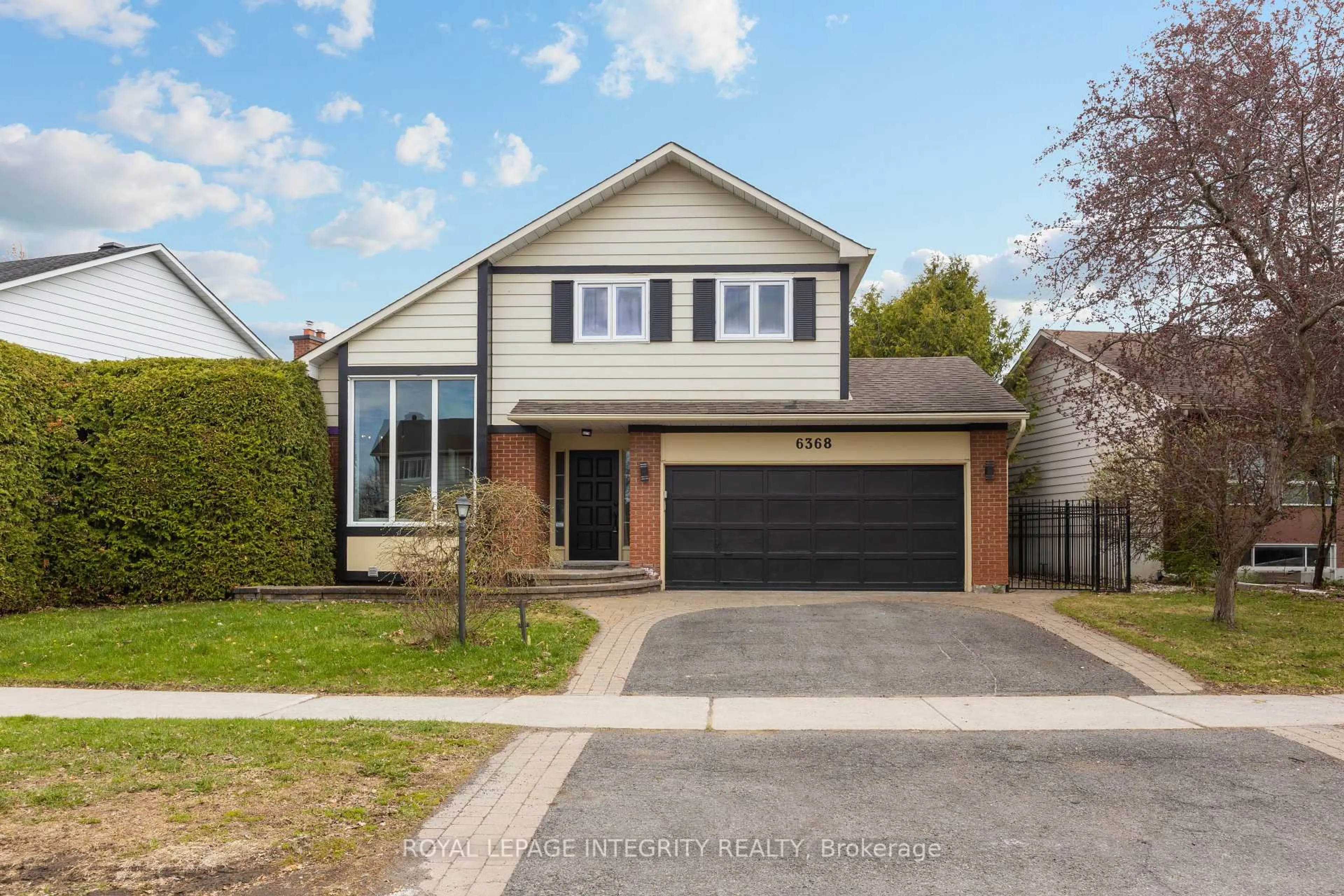 Home with brick exterior material, street for 6368 Viseneau Dr, Orleans Ontario K1C 2J2