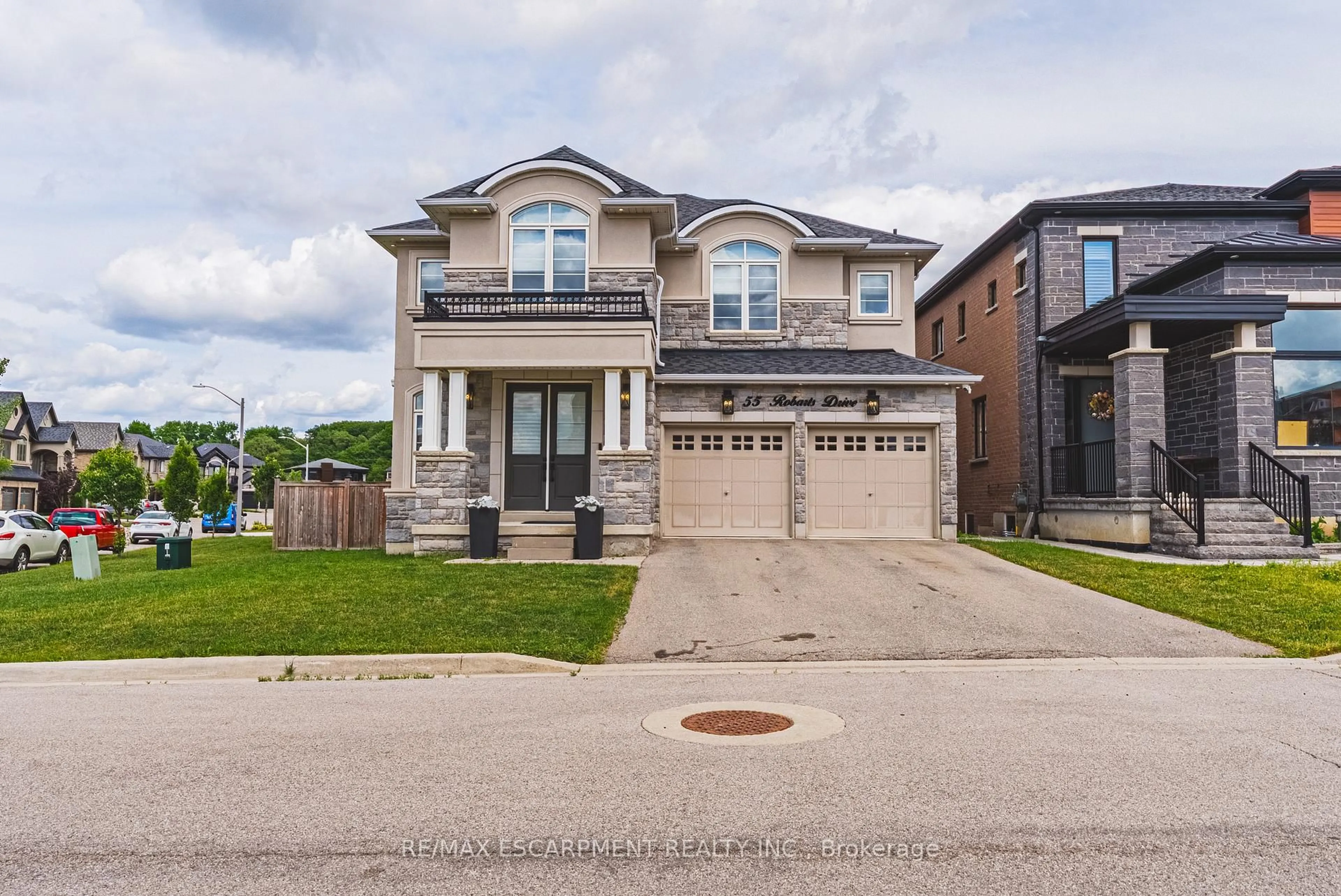Home with brick exterior material, street for 55 Robarts Dr, Hamilton Ontario L9K 0H5