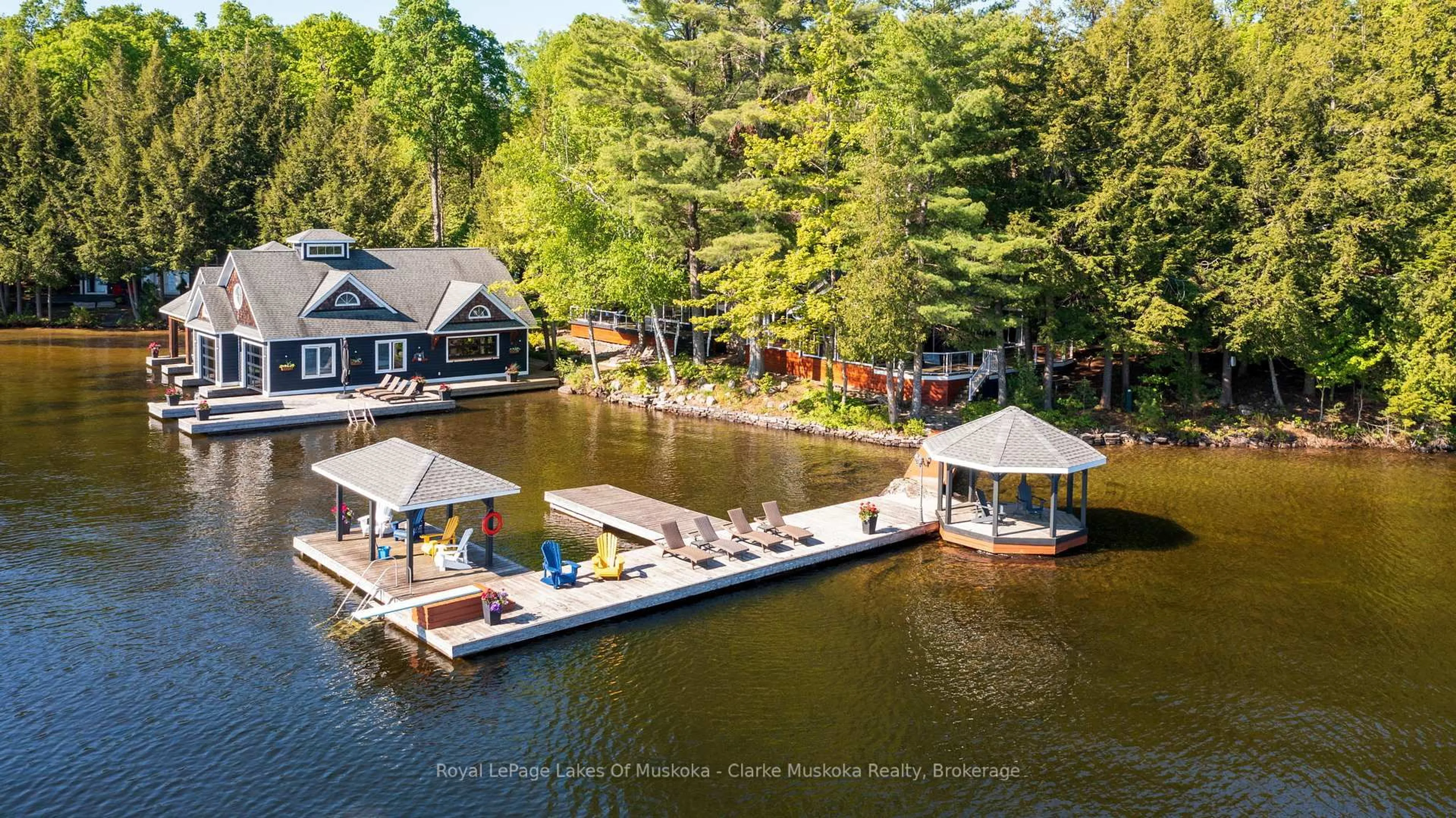 A pic from outside/outdoor area/front of a property/back of a property/a pic from drone, water/lake/river/ocean view for 1118 Shamrock Rd, Muskoka Lakes Ontario P0B 1J0