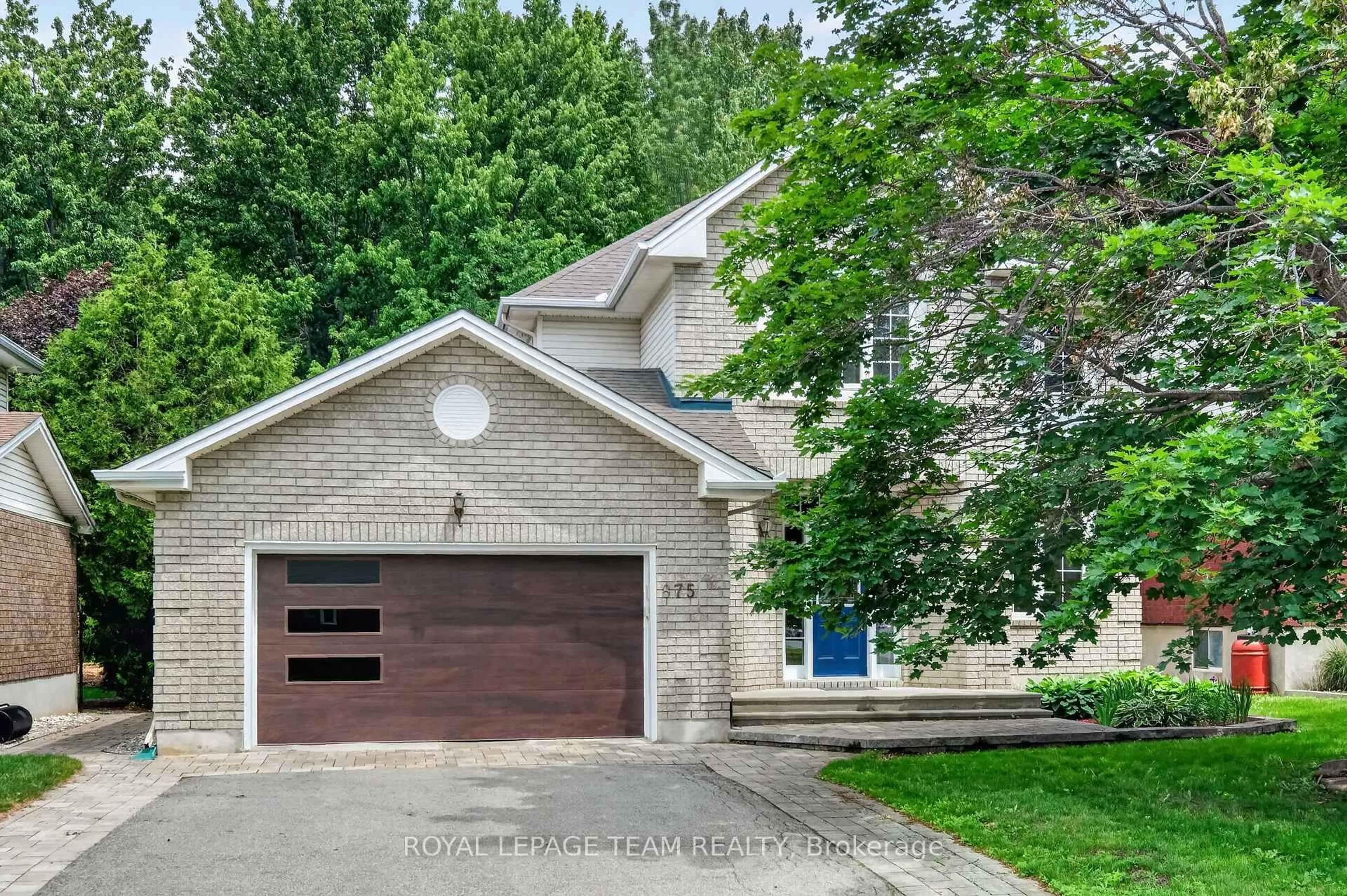 Home with brick exterior material, street for 875 Giant Cedars Cres, Ottawa Ontario K1V 1P1