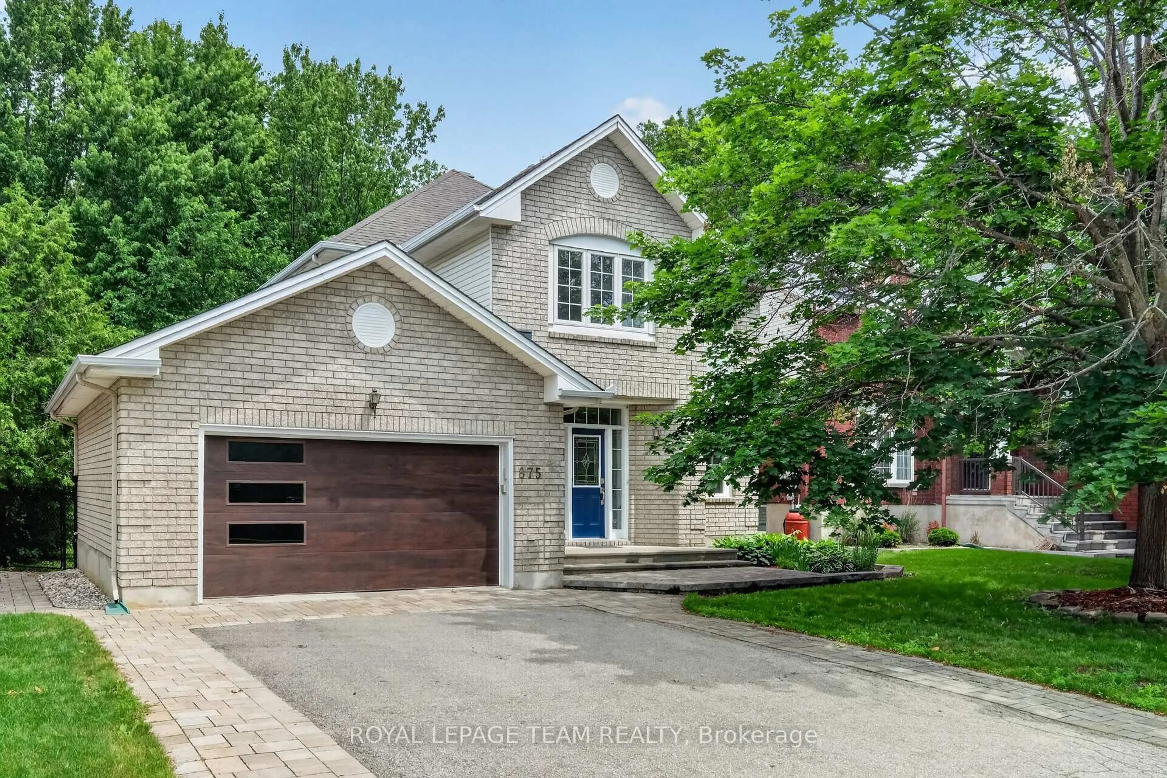 Home with brick exterior material, street for 875 Giant Cedars Cres, Ottawa Ontario K1V 1P1